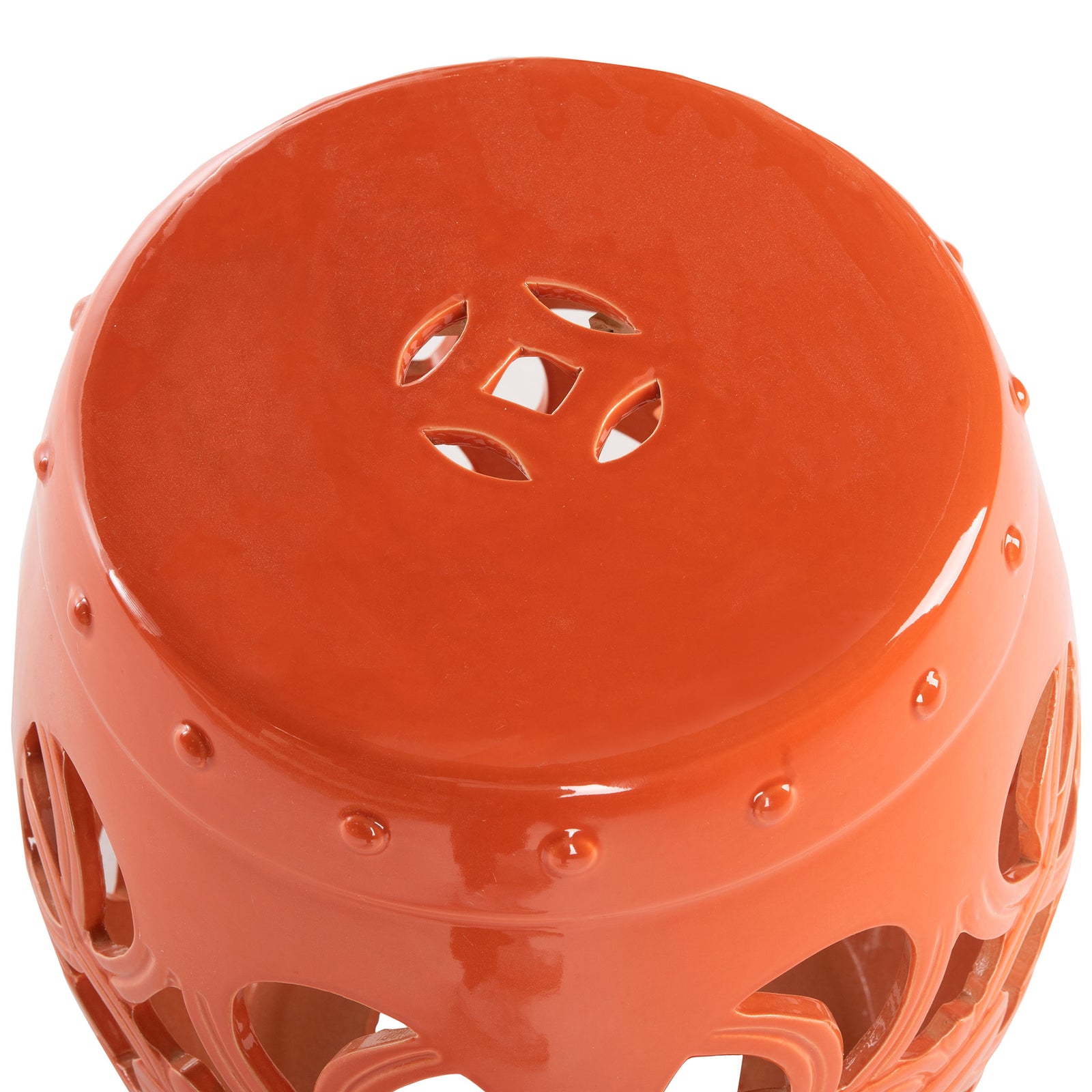 A small floral cutout accents the smooth, glossy orange ceramic seat || ACS4539D || detail_studio