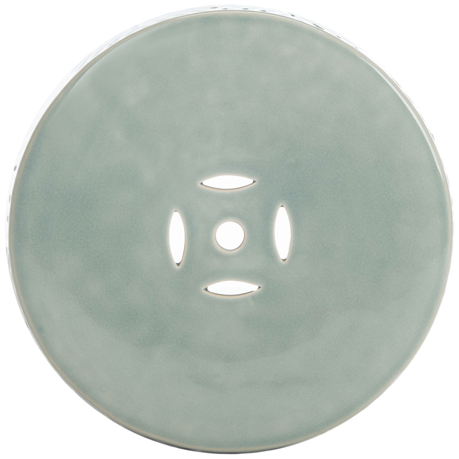 Five small cutouts form a flowerlike design in the stool's smooth blue ceramic top. || ACS4578A || top_studio