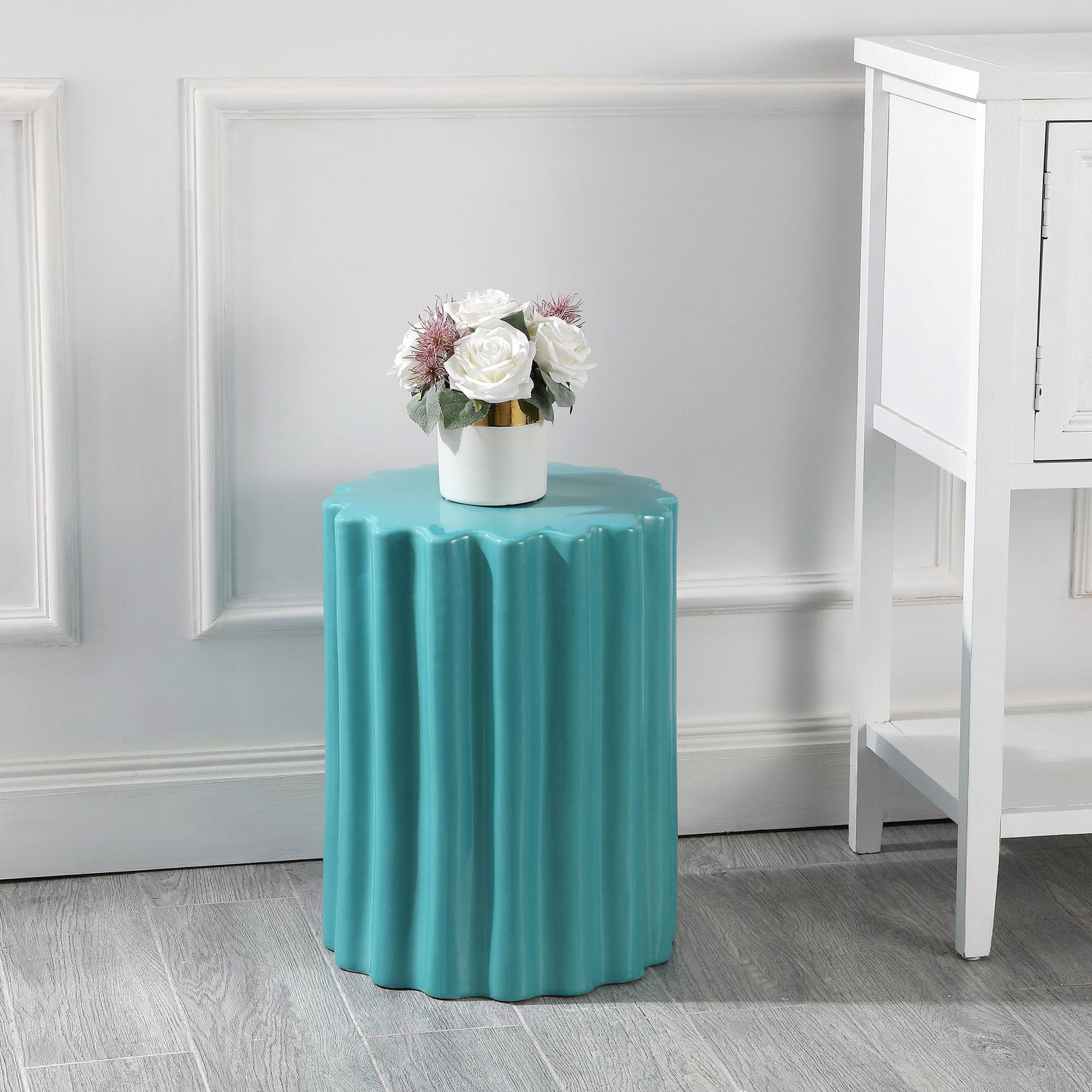 Glossy blue garden stool with fluted sides doubles as a table for fresh flowers || ACS4600B || front_angle_room