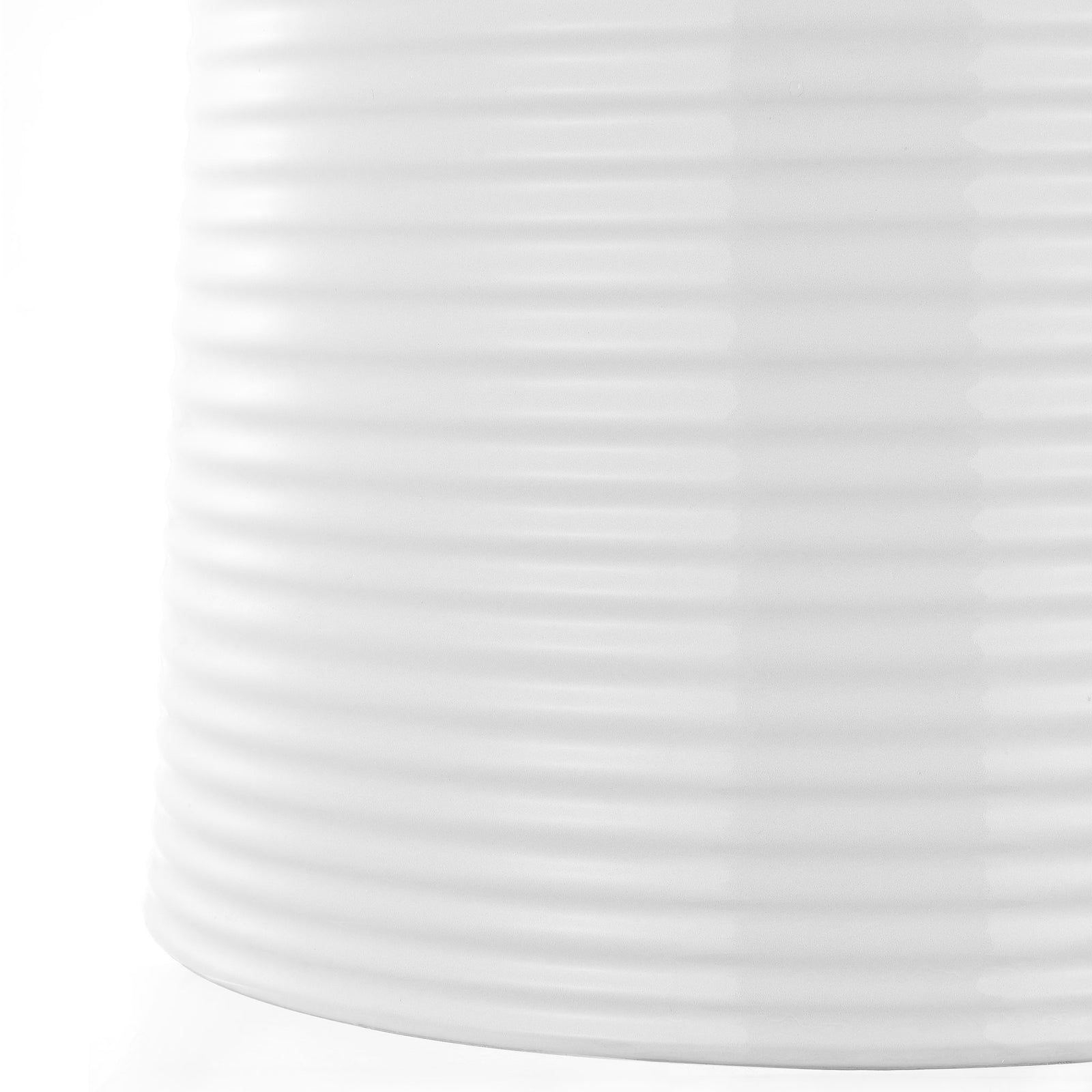 White ceramic base flares toward its lower edge beneath closely spaced horizontal ridges || ACS4605A || leg_studio