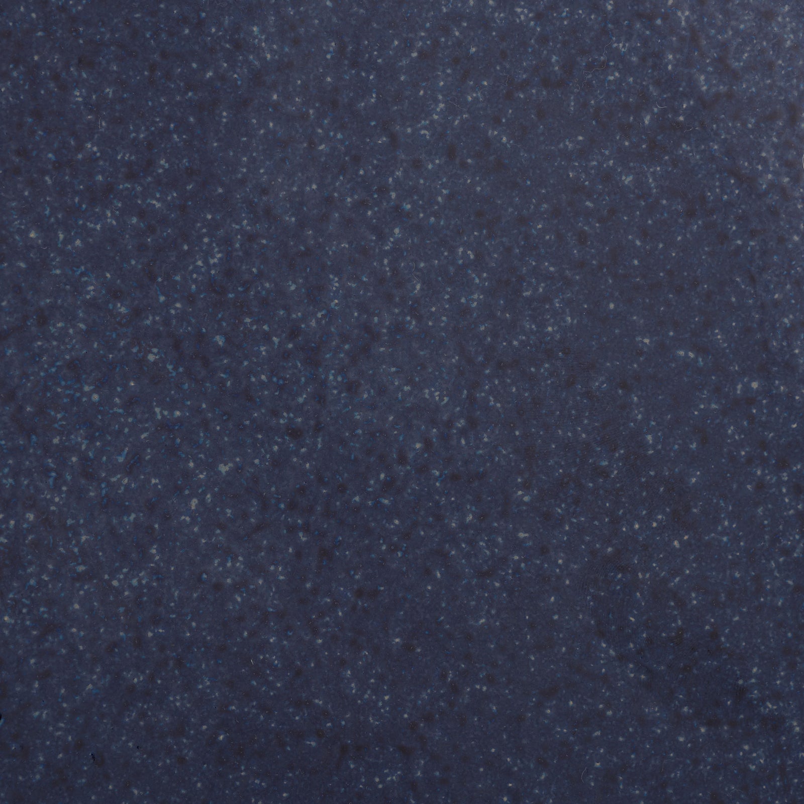 Fine flecks of navy and cobalt add depth to the glazed blue ceramic finish. || ACS4611B || swatch_studio