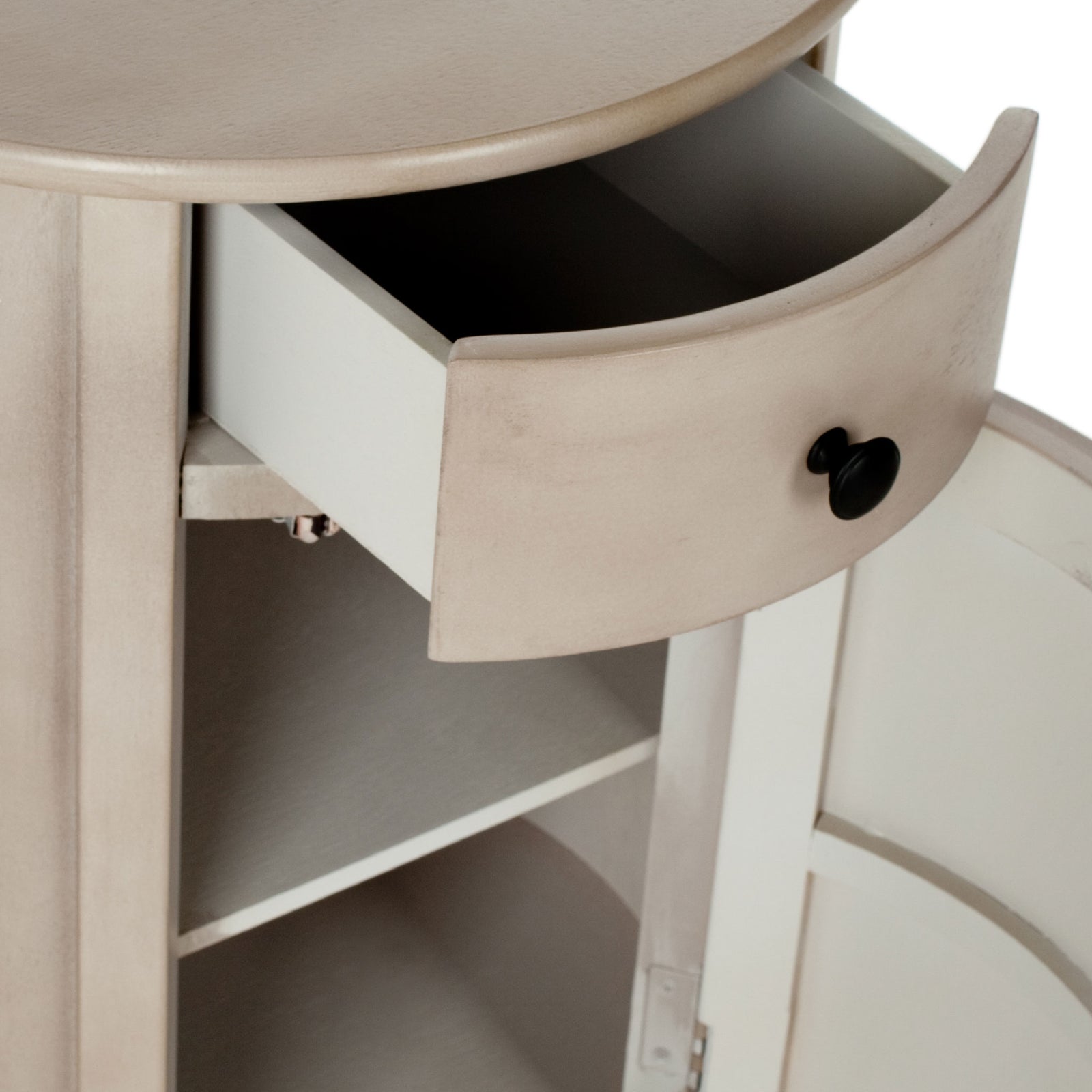 A light vintage gray finish frames the open drawer and cabinet shelving of this round table || AMH5712A || storage_open_studio
