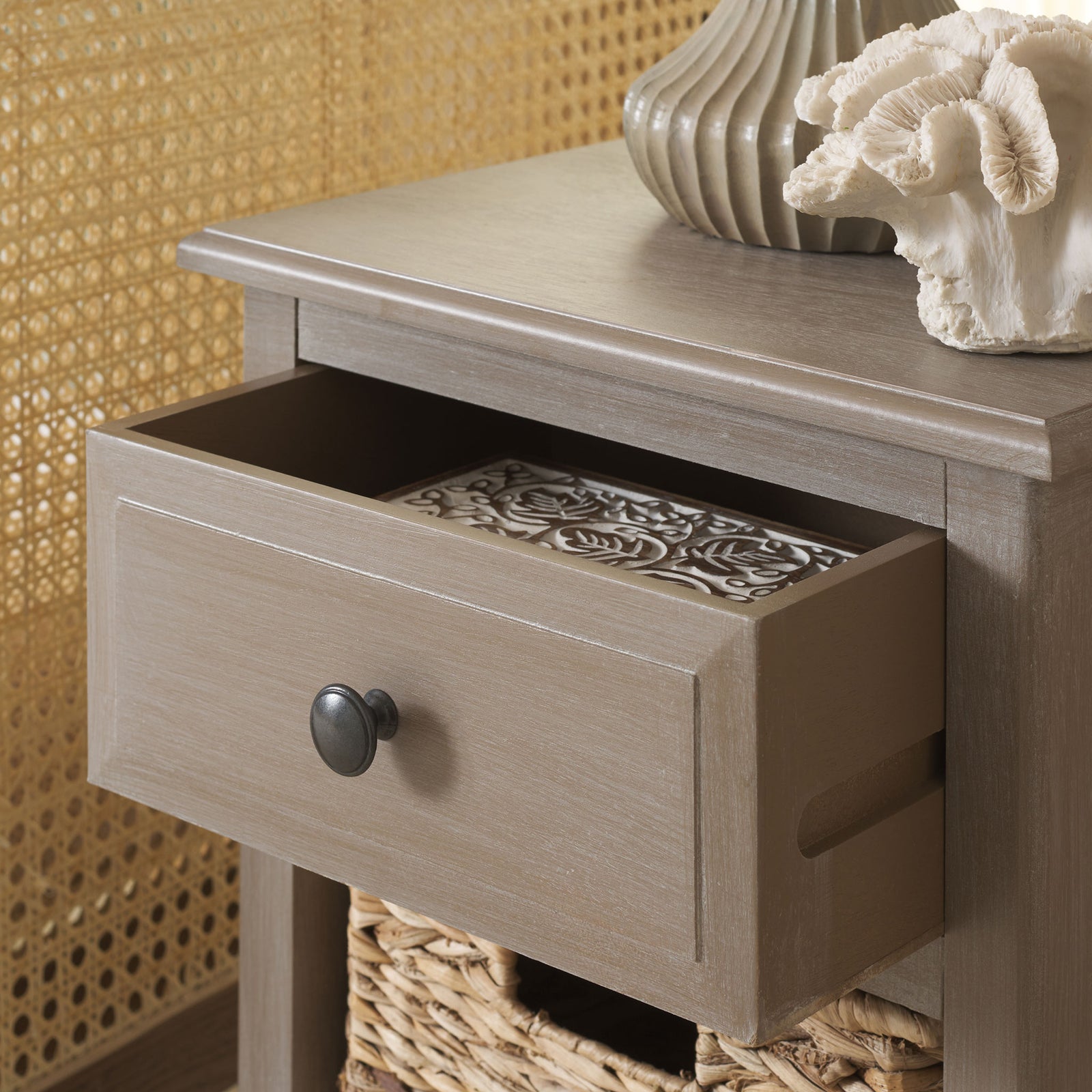 An open wood drawer keeps essentials close, with a dark round knob and woven storage below. || AMH5743E || storage_open_room