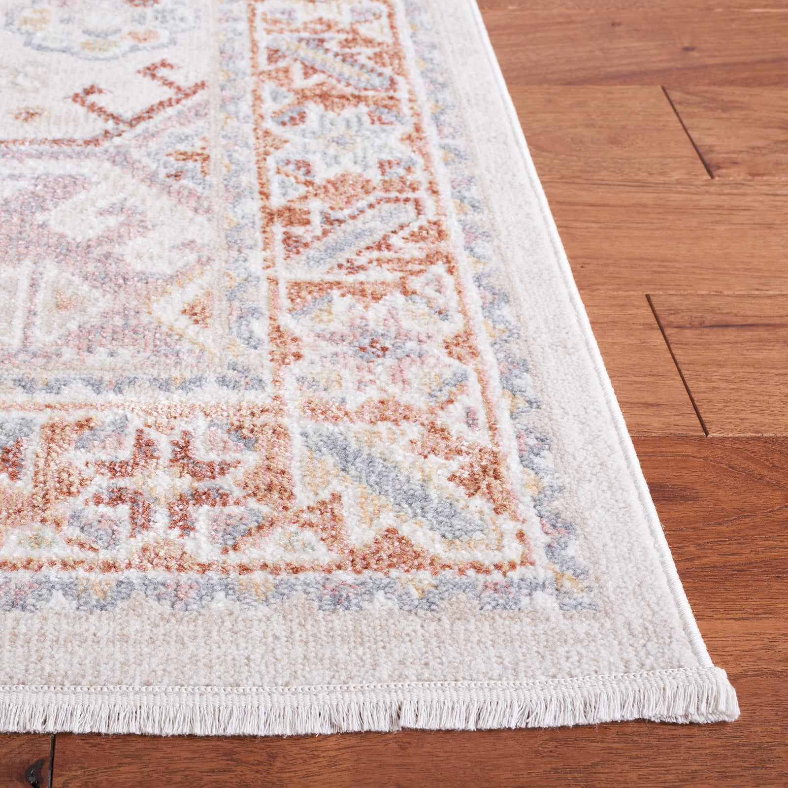 Detailed corner highlights soft fringe, crisp binding, and the multi-tonal border pattern. || BLR202B-5 || corner_room