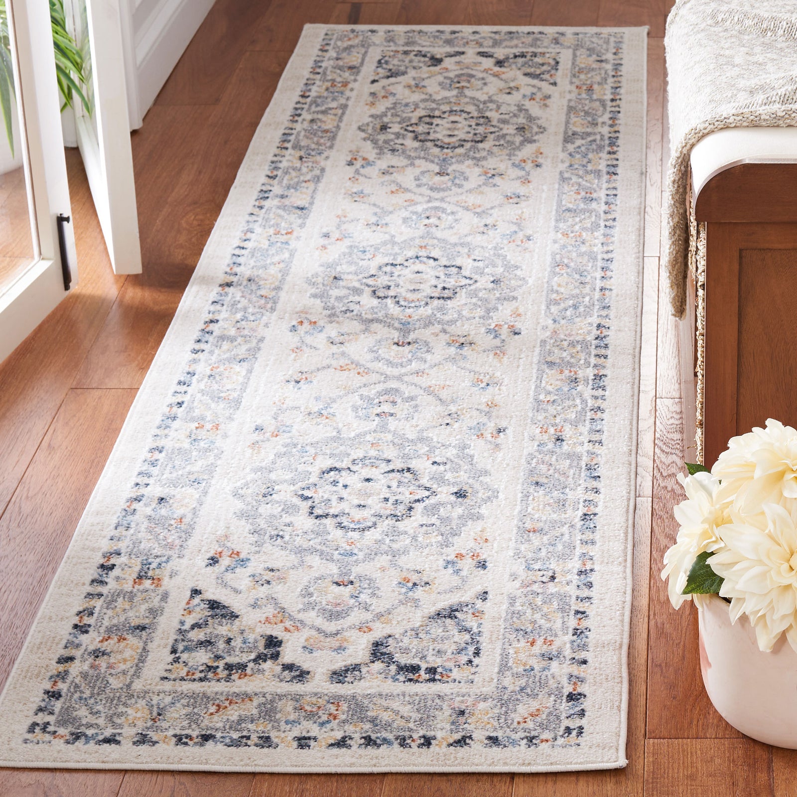 Washable vintage-look runner with softly distressed medallions in beige, gray, and navy || BLR204B-28 || top_room