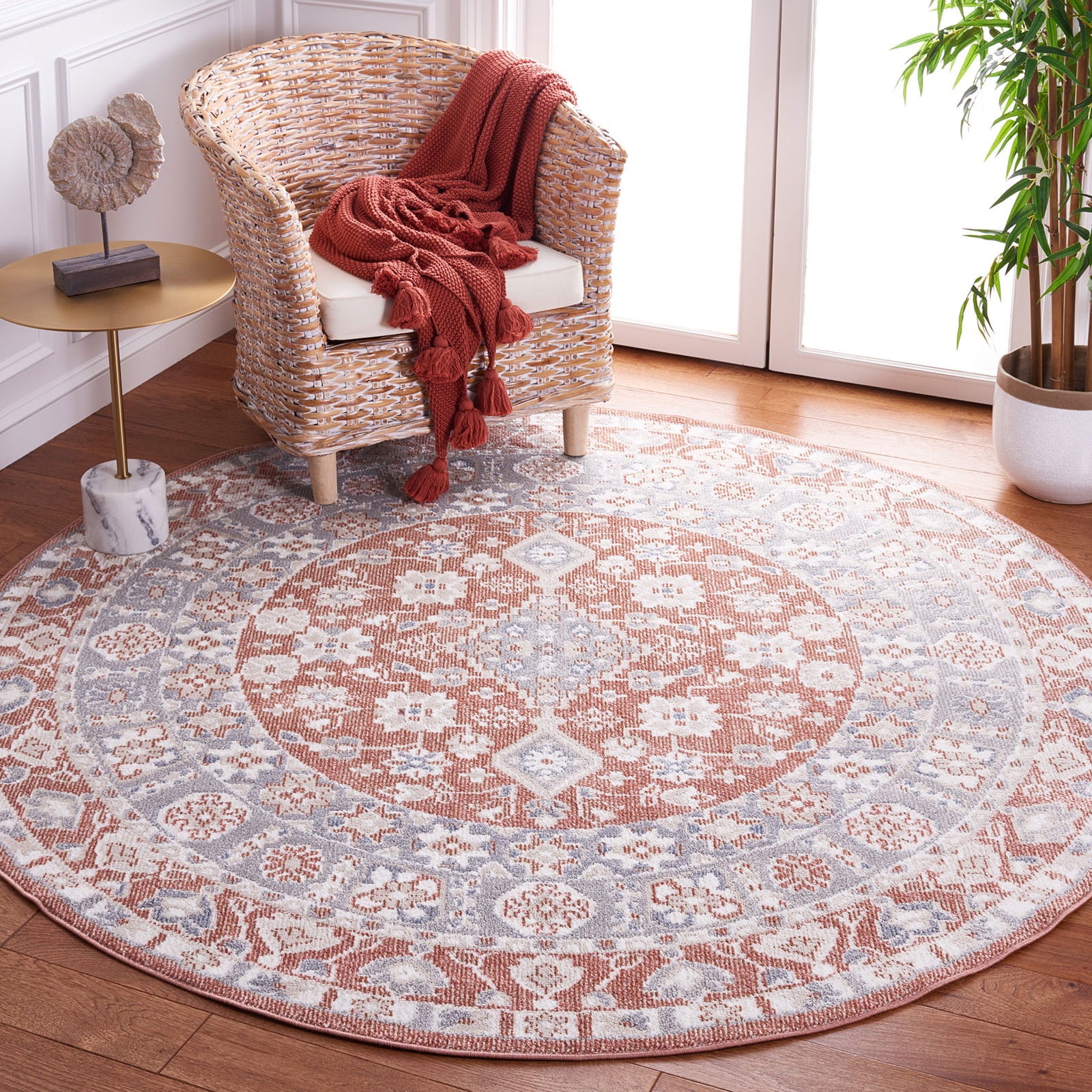 Round rose and gray medallion rug anchors the room with soft patterning and a vintage vibe || BLR206U-7R || front_angle_room