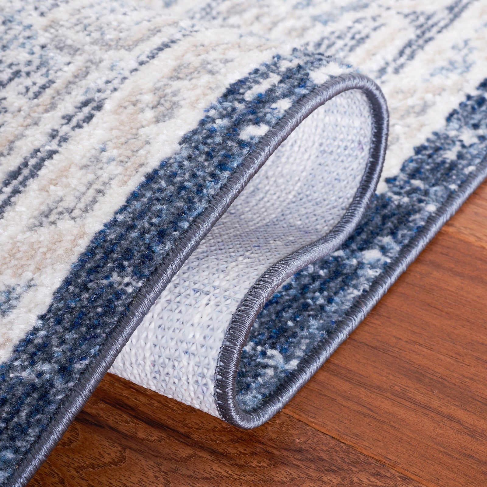 Durable patterned backing with serged edge and flexible, easy-to-lift design || BLR210B-5 || backing_room