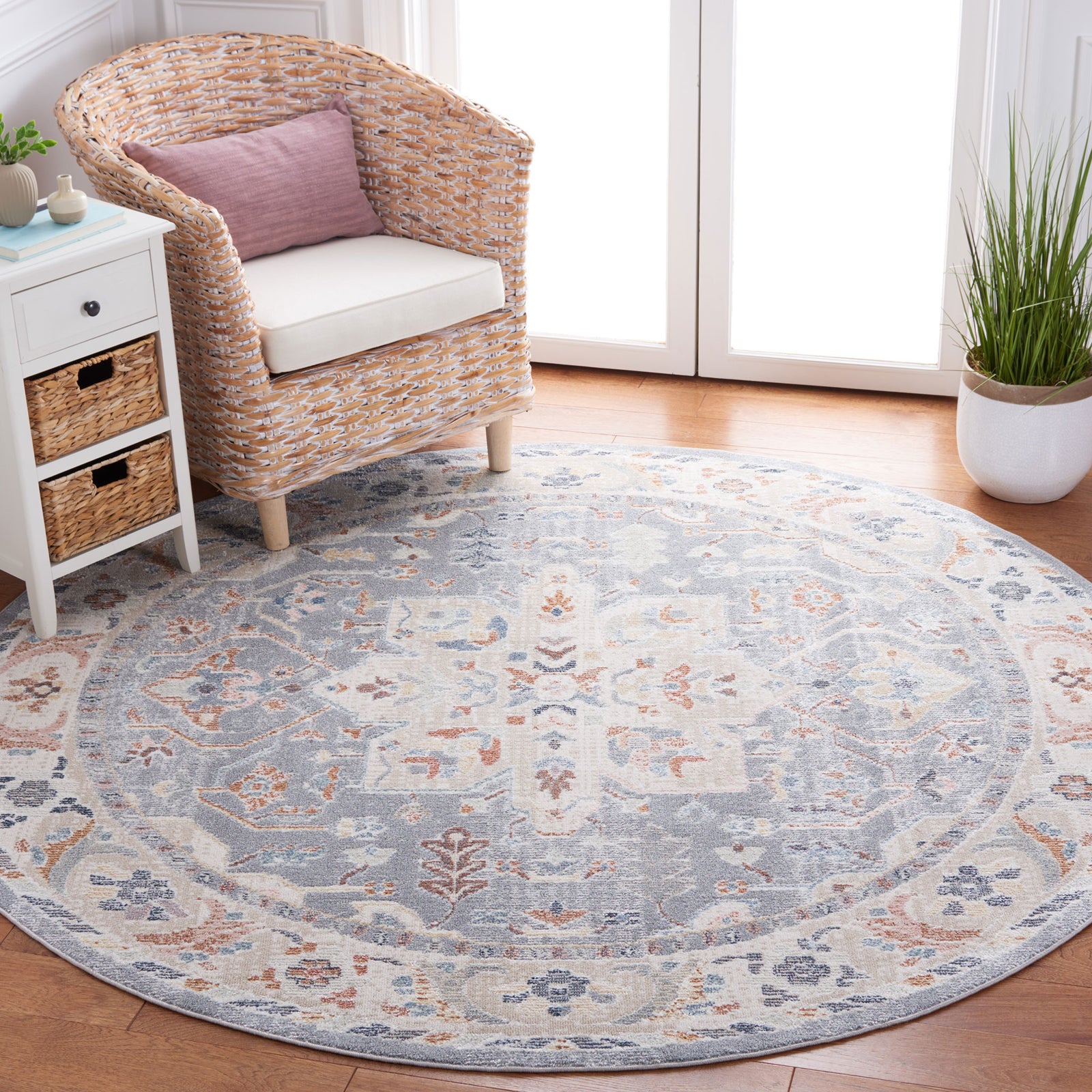 Vintage-inspired round rug in calming beige and blue anchors the room with a soft, cushioned feel. || BLR212B-7R || top_room