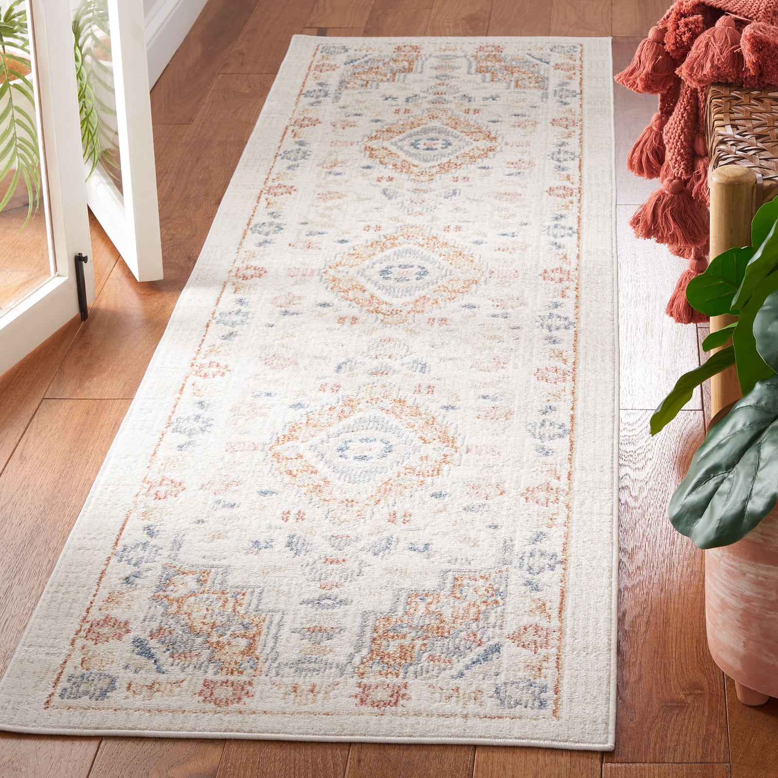 Vintage-inspired washable runner in beige and rust with diamond medallions and soft low pile || BLR214B-28 || front_angle_room