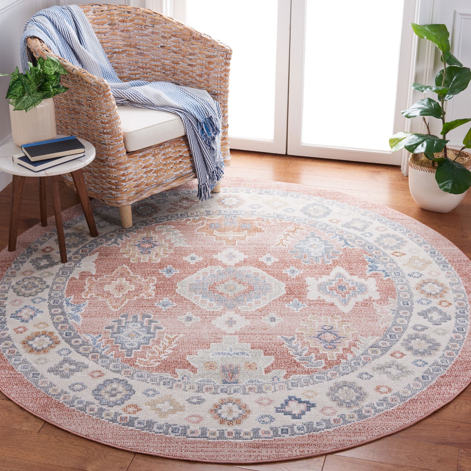Vintage-inspired round rug in rose and blue brightens the room with soft, washable comfort || BLR218U-7R || top_room