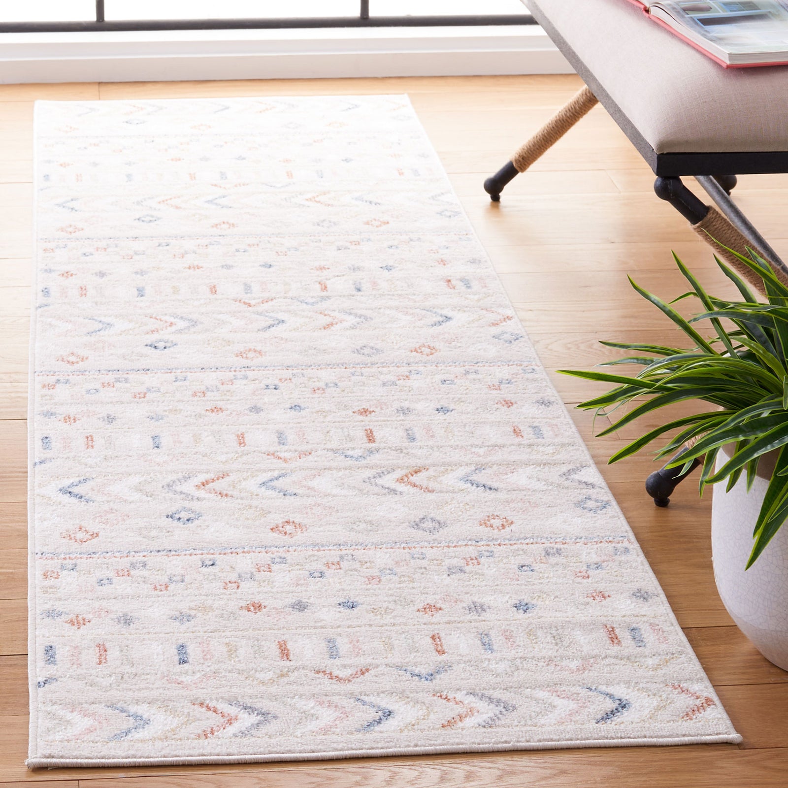 Beige runner rug with soft multicolor geometric motifs brings subtle pattern to modern spaces || BLR226B-28 || top_angle_room