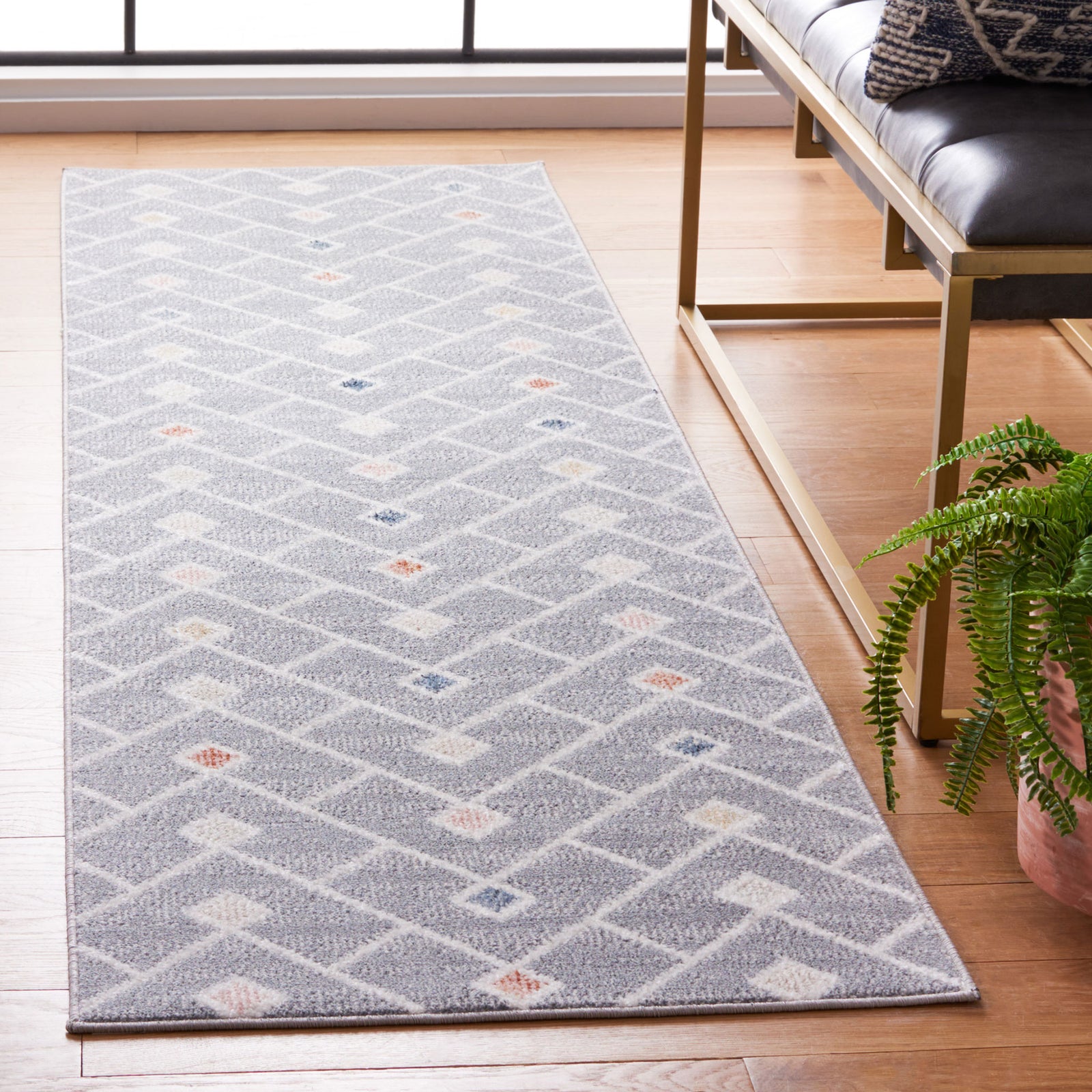 Runner rug in soft gray with a chevron lattice and playful multicolor diamond motifs || BLR230F-28 || top_angle_room