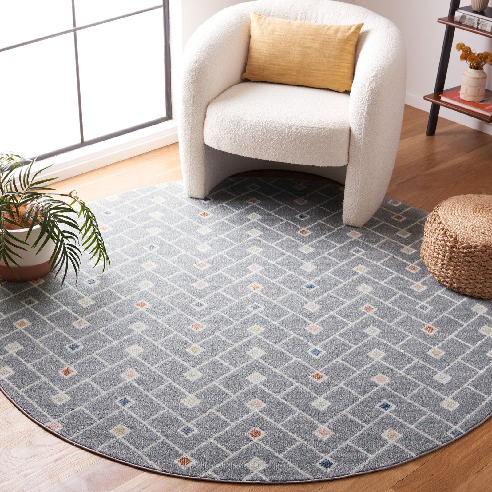 Geometric round gray rug with subtle texture and colorful diamond accents across a herringbone pattern || BLR230F-7R || top_room