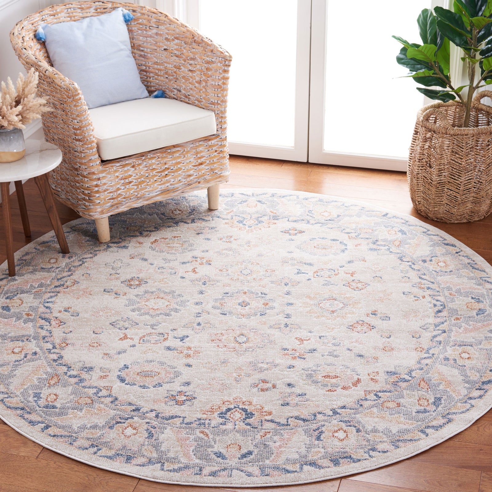 Vintage-inspired round rug in beige and gray with subtle blue accents, brightening decor with easygoing charm. || BLR232B-7R || top_angle_room