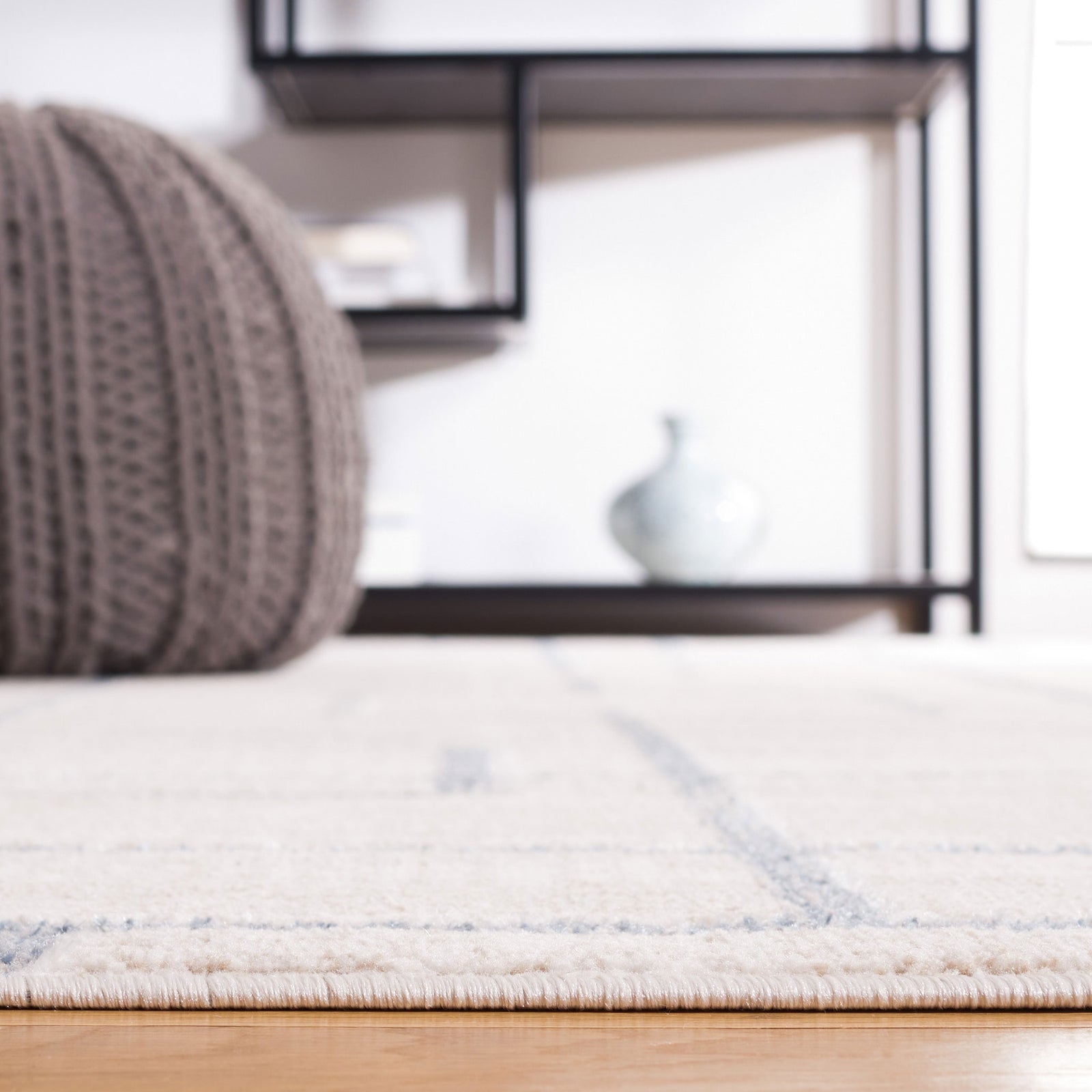 Low-profile pile with soft, cushioned feel in a beige and gray geometric design || BLR238B-5 || detail_room