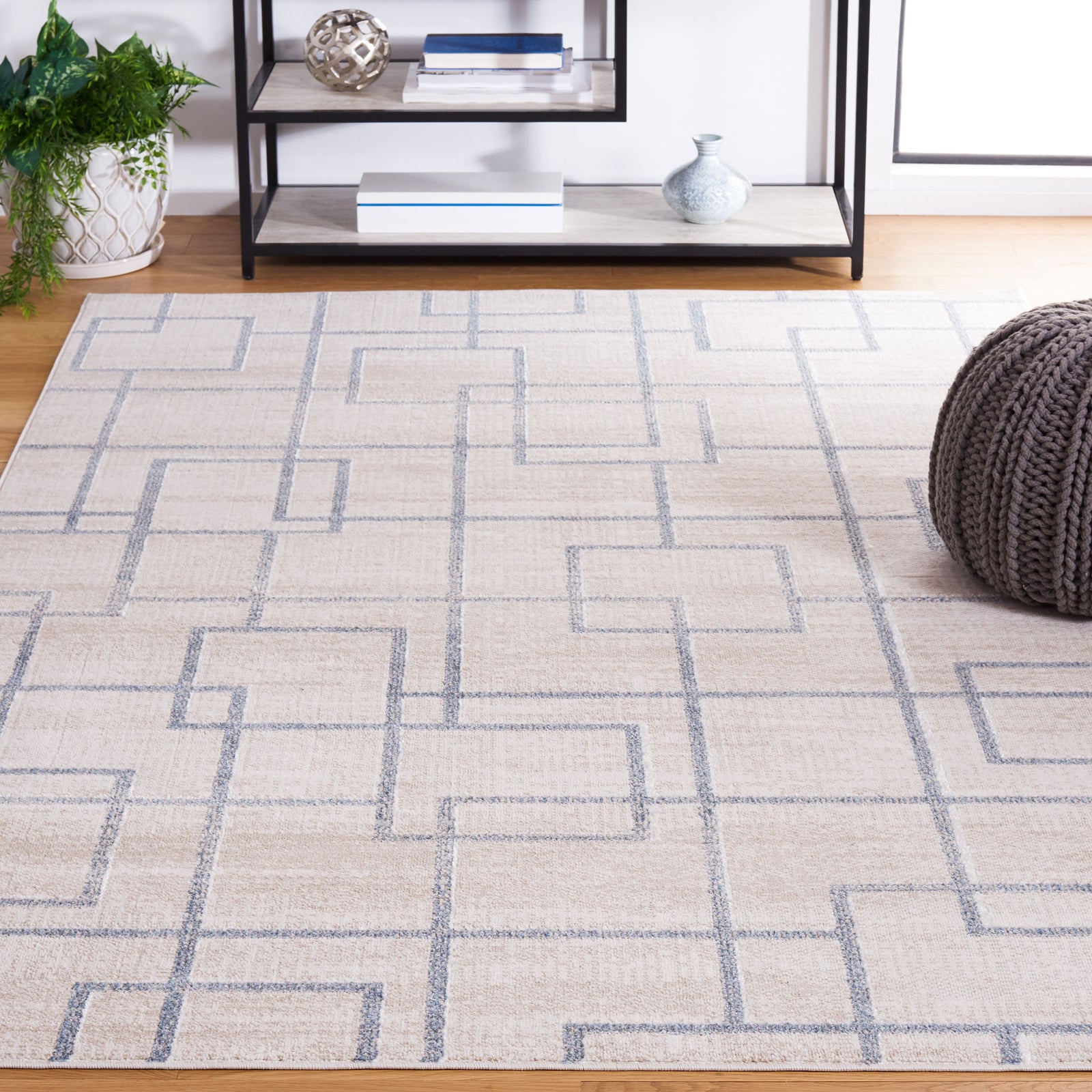Beige and gray geometric area rug anchors a modern room with clean-lined pattern || BLR238B-5 || front_angle_room