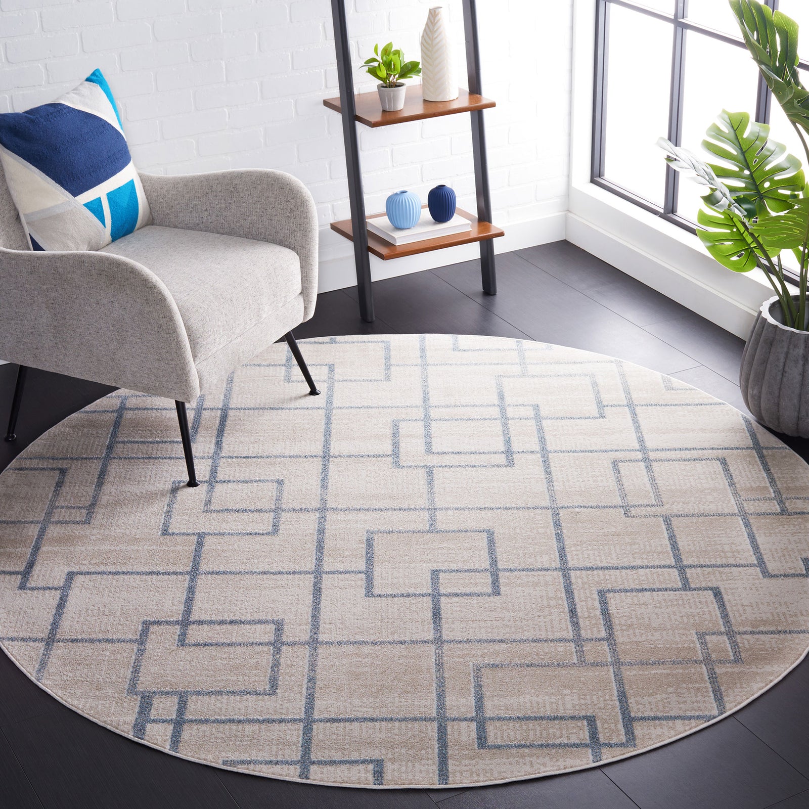 Round beige and gray geometric rug adds crisp pattern and soft texture to modern decor || BLR238B-7R || front_angle_room