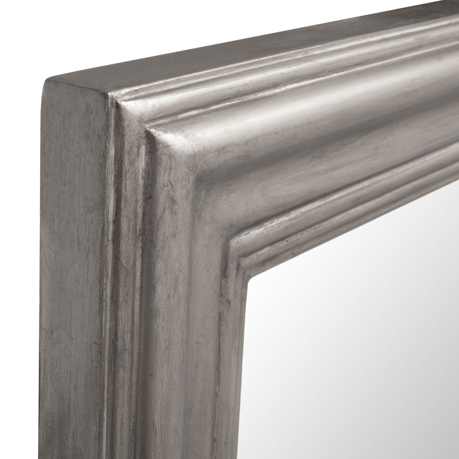 Sculpted silver frame features layered ridges, mitered corners, and a brushed metallic finish. || CMI2004B || detail_studio