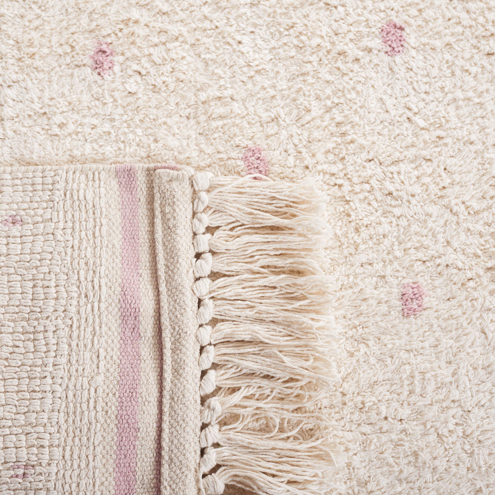 Folded corner reveals sturdy woven backing and tassel detail || ECR212U-5 || backing_room