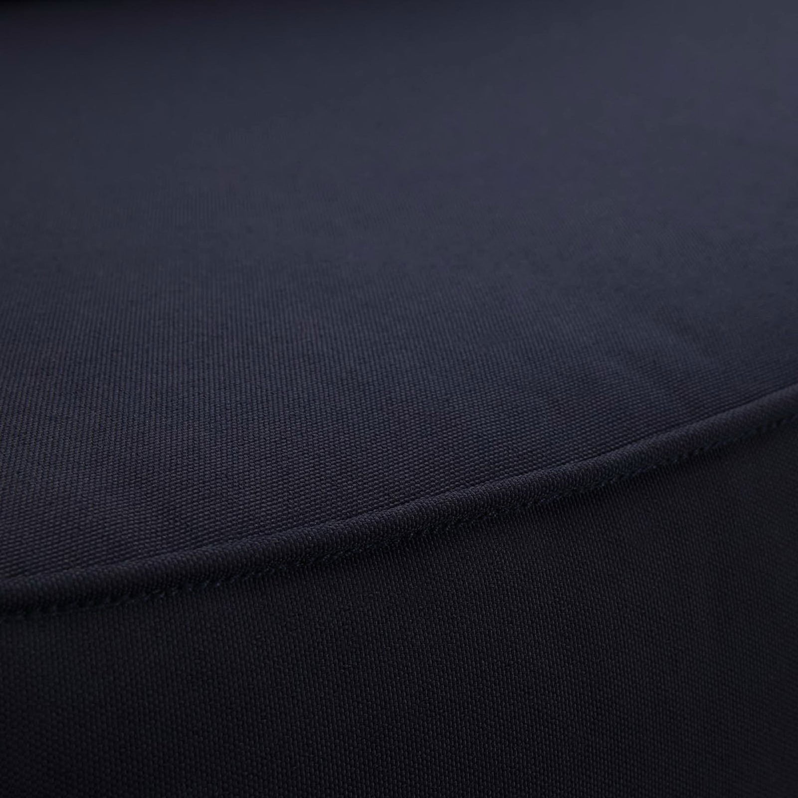 Dark navy outdoor cushion fabric featuring a smooth, tightly woven texture || EEI-1143-NAT-NAV-SET || swatch_studio