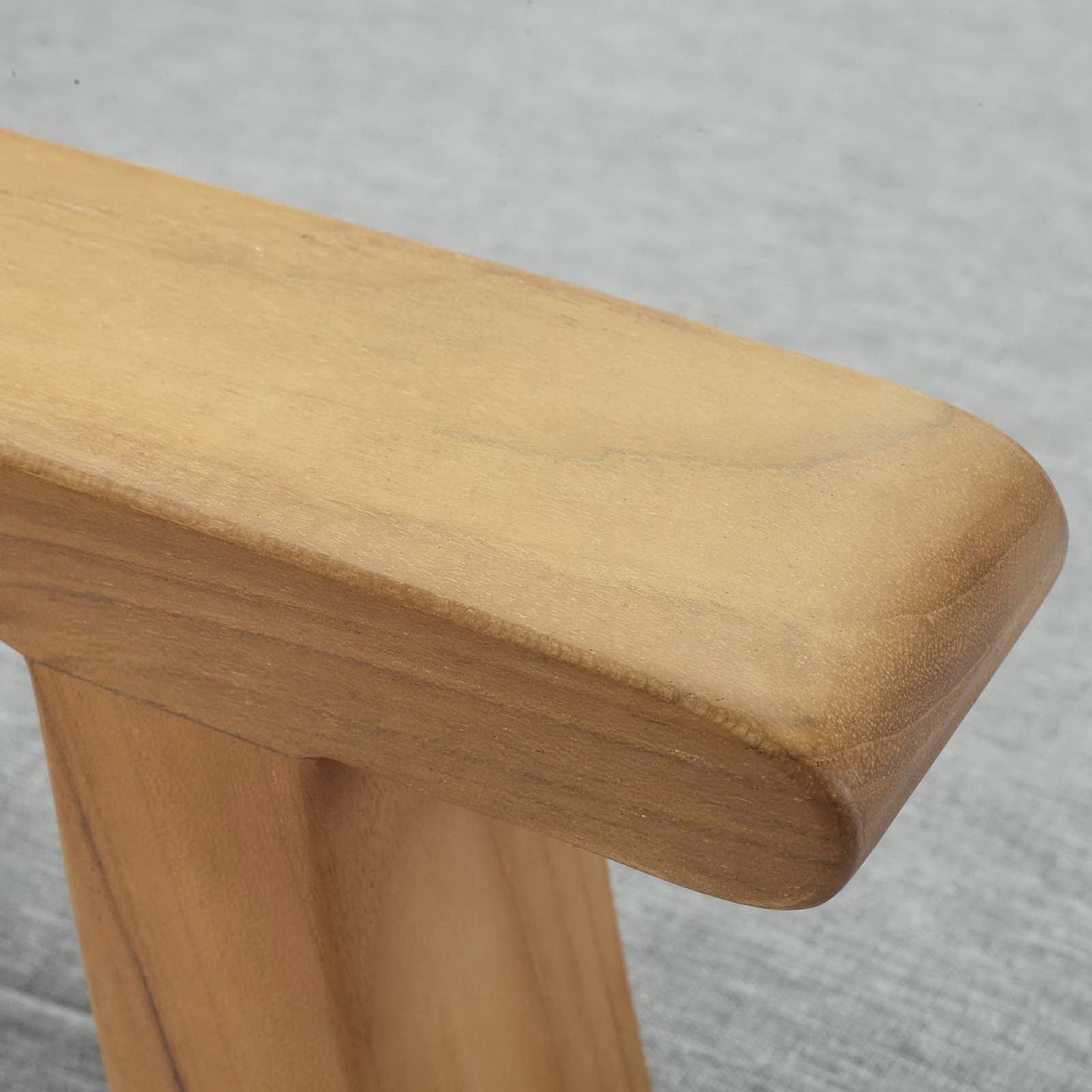 Smoothly finished teak armrest highlights the warm natural wood grain beside gray cushions || EEI-1144-NAT-GRY-SET || detail_studio