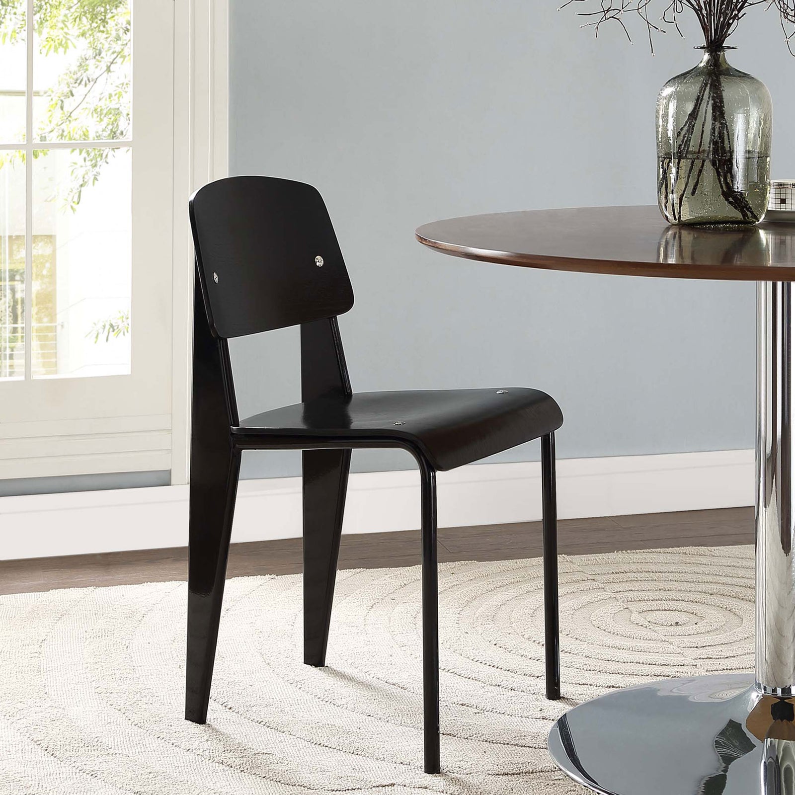 Black bentwood dining chair paired with a round table, creating a sleek, modern focal point in the dining room || EEI-214-BLK-BLK || front_angle_room