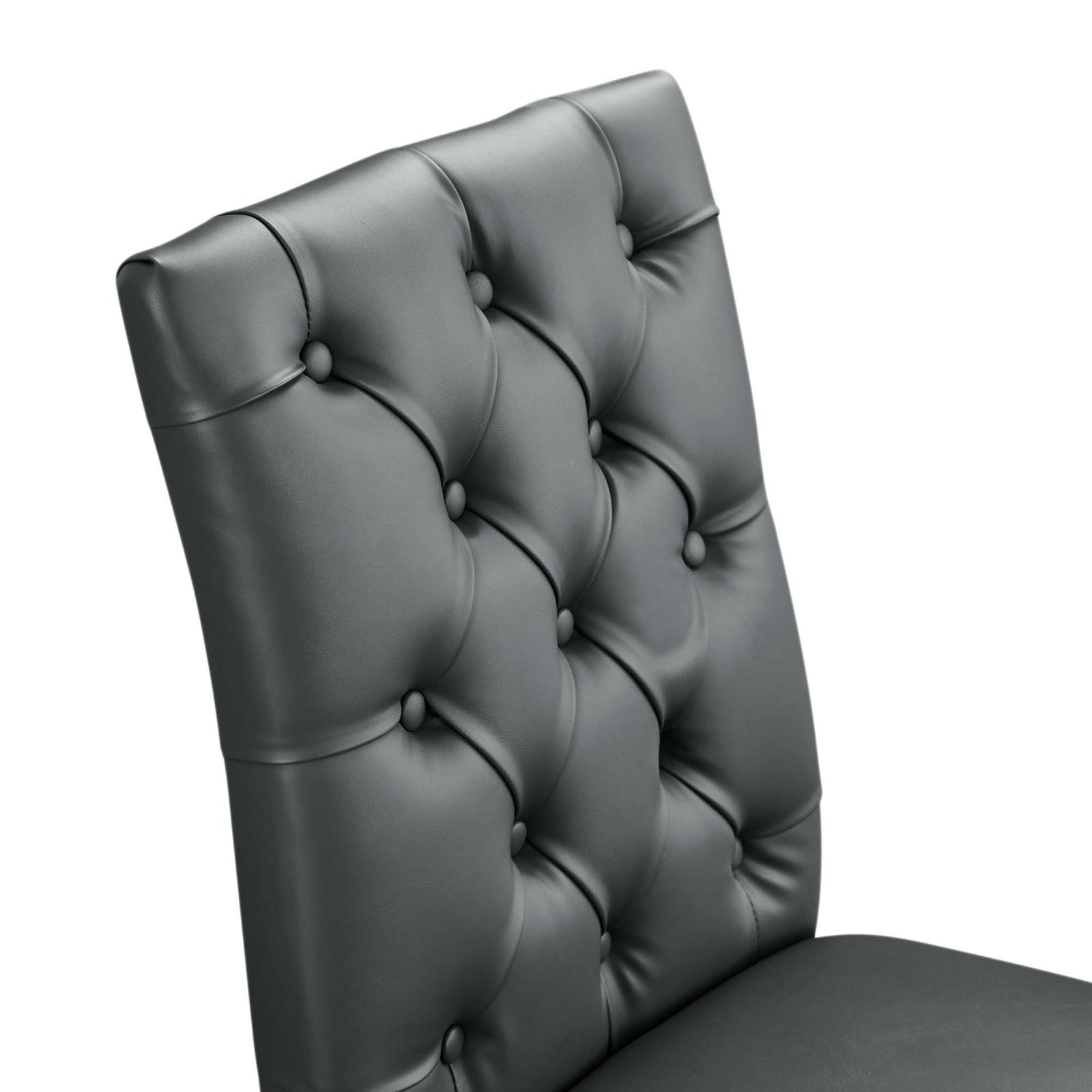 Deep button tufting and smooth gray vegan leather upholstery on the Duchess dining chair || EEI-2230-GRY || detail_studio