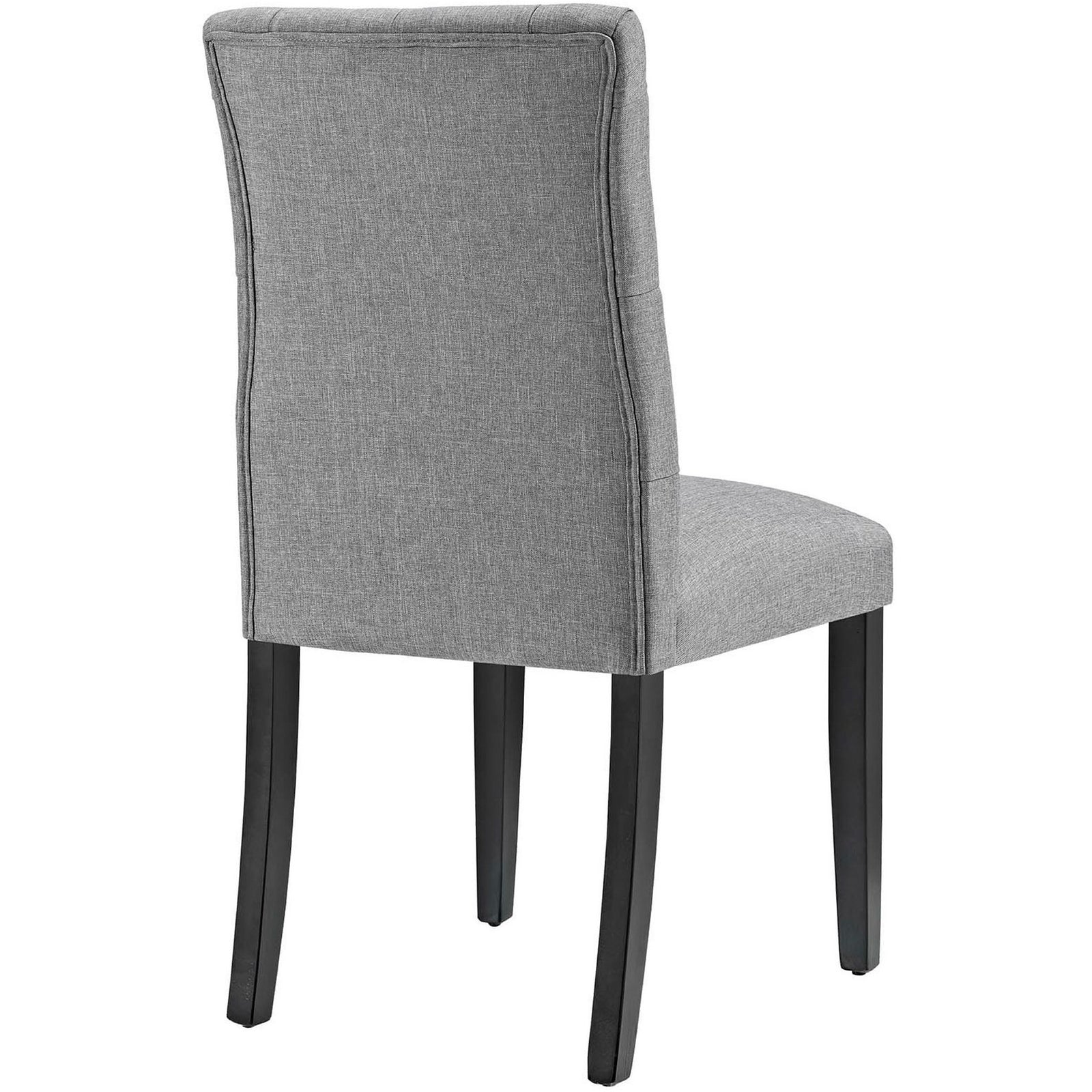 Light gray dining chair with gently curved backrest and button tufting for refined support || EEI-2231-LGR || back_angle_studio
