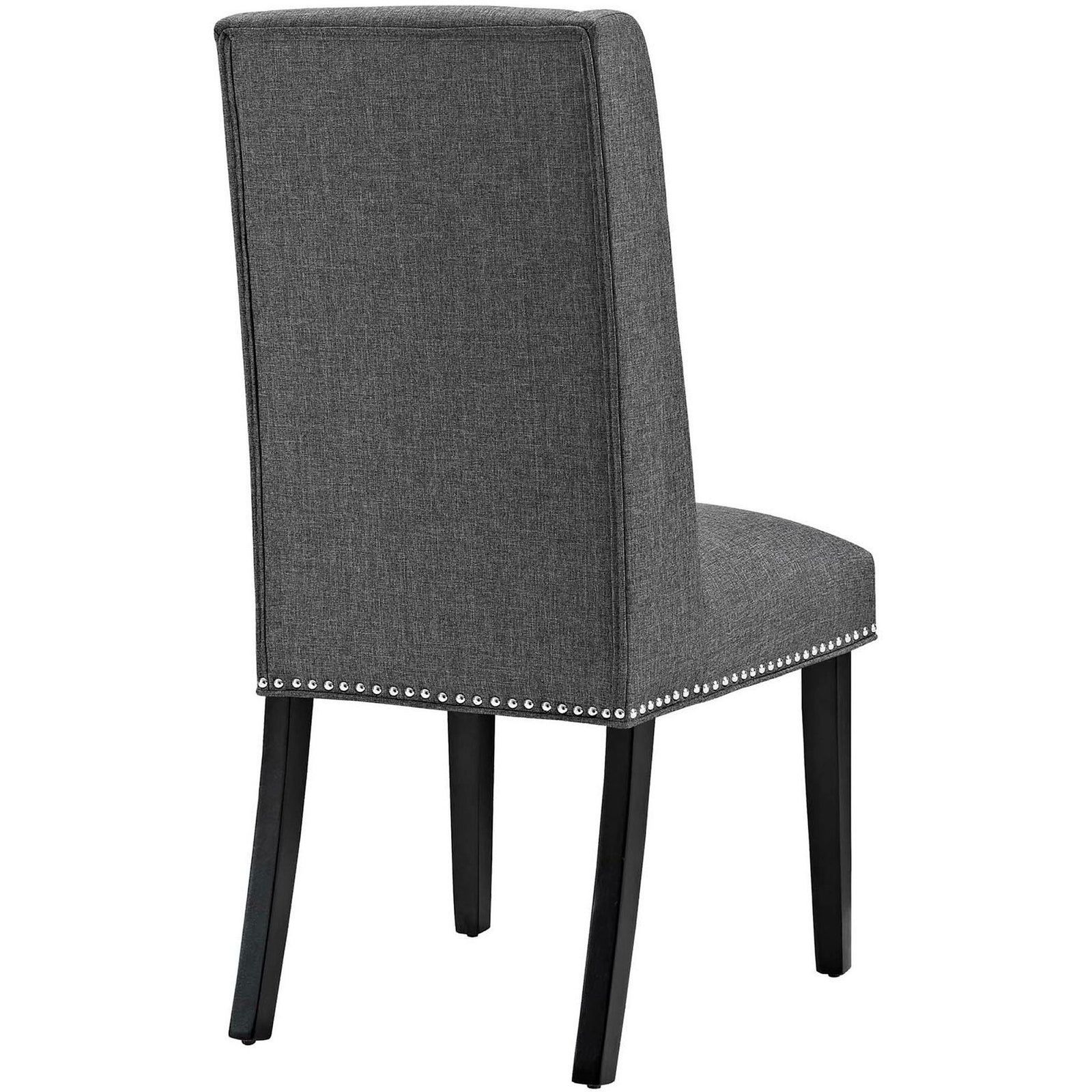Elegant gray dining chair highlighting the smooth tailored back, nailhead trim, and straight dark wood legs. || EEI-2233-GRY || back_angle_studio