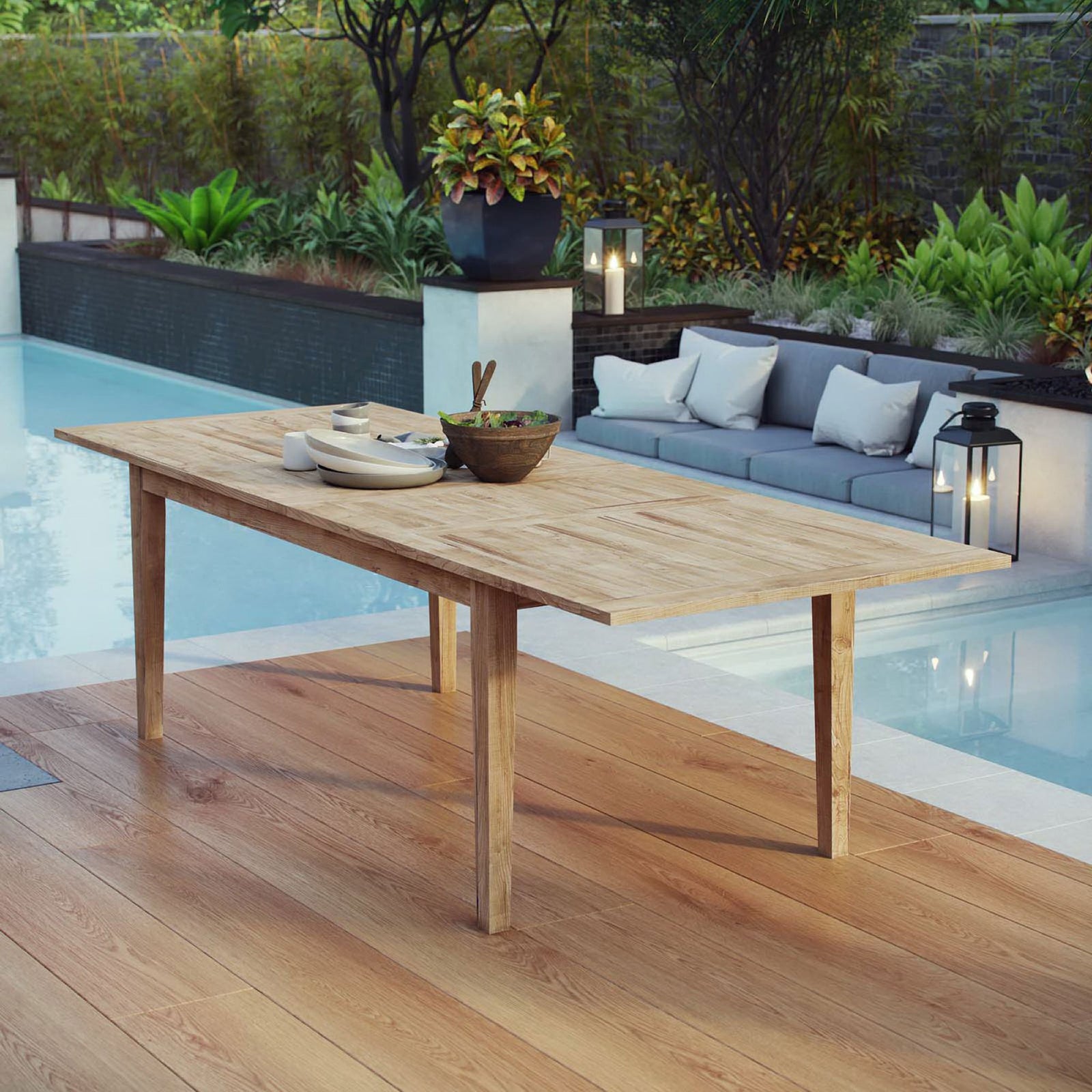 Natural teak patio dining table styled by a poolside lounge setting || EEI-2714-NAT || front_angle_room
