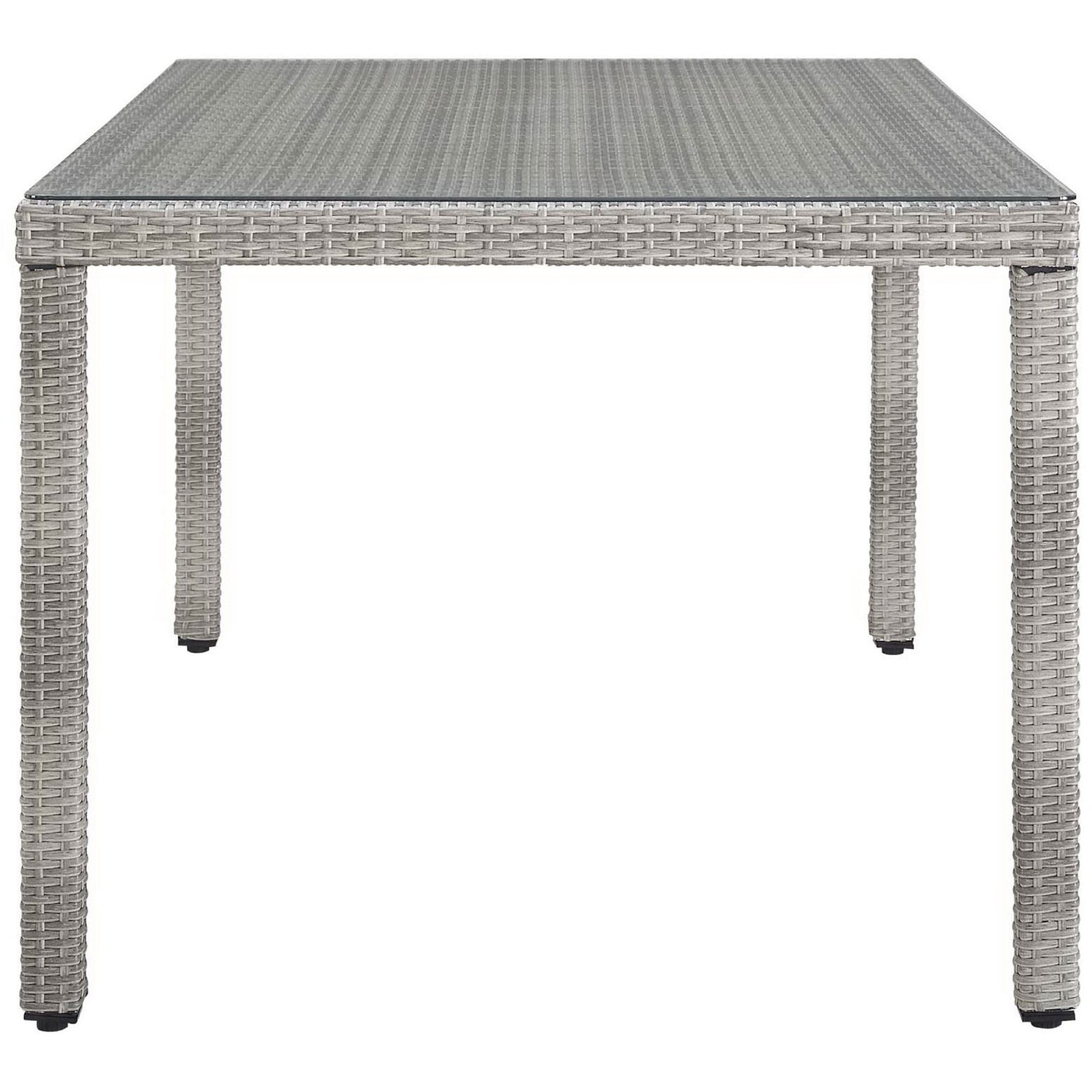 Spacious rectangular patio table showcasing sturdy gray rattan frame and glass tabletop || EEI-2921-GRY || side_studio