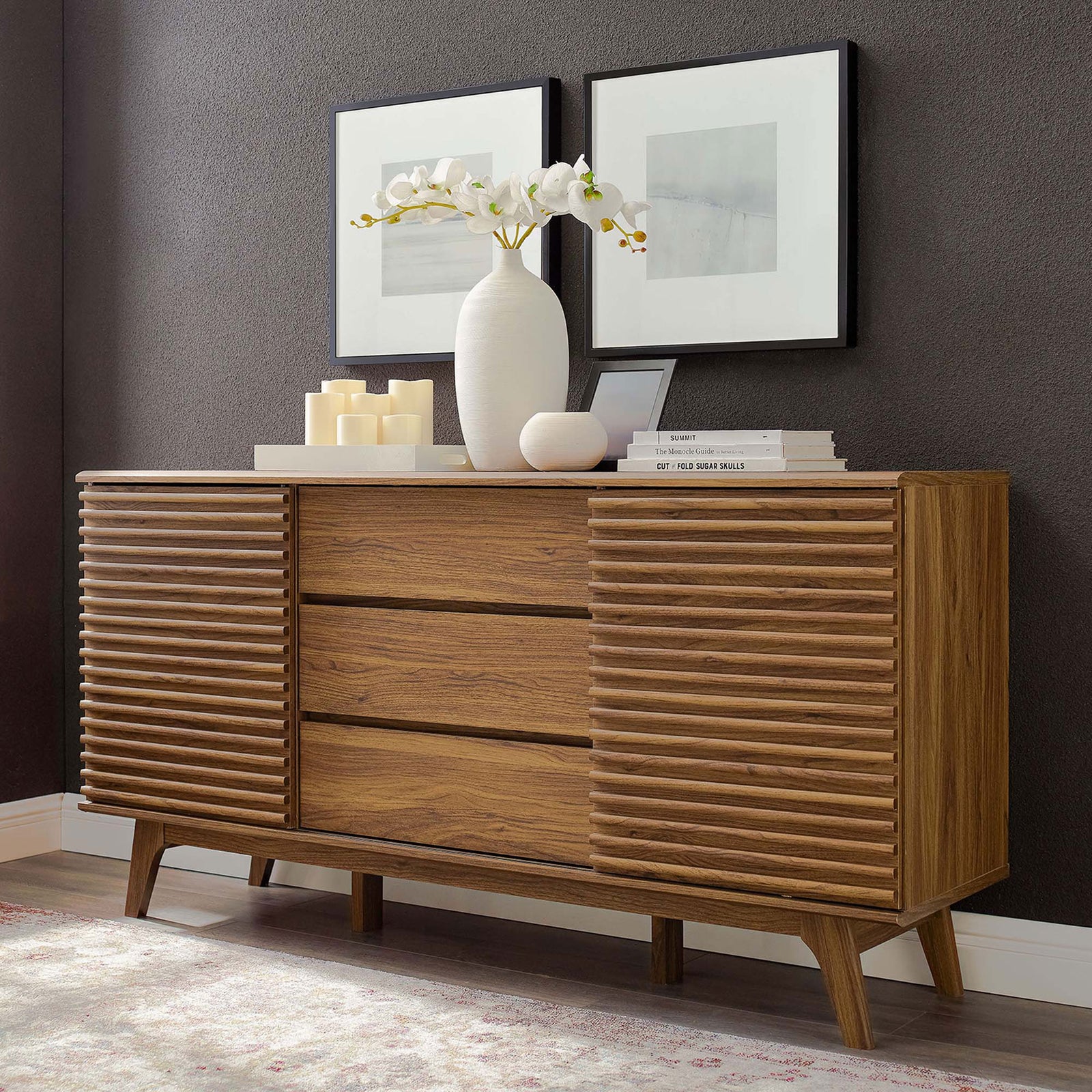 Walnut sideboard styled with ceramics and books, grounding a sophisticated living space || EEI-3344-WAL || front_angle_room
