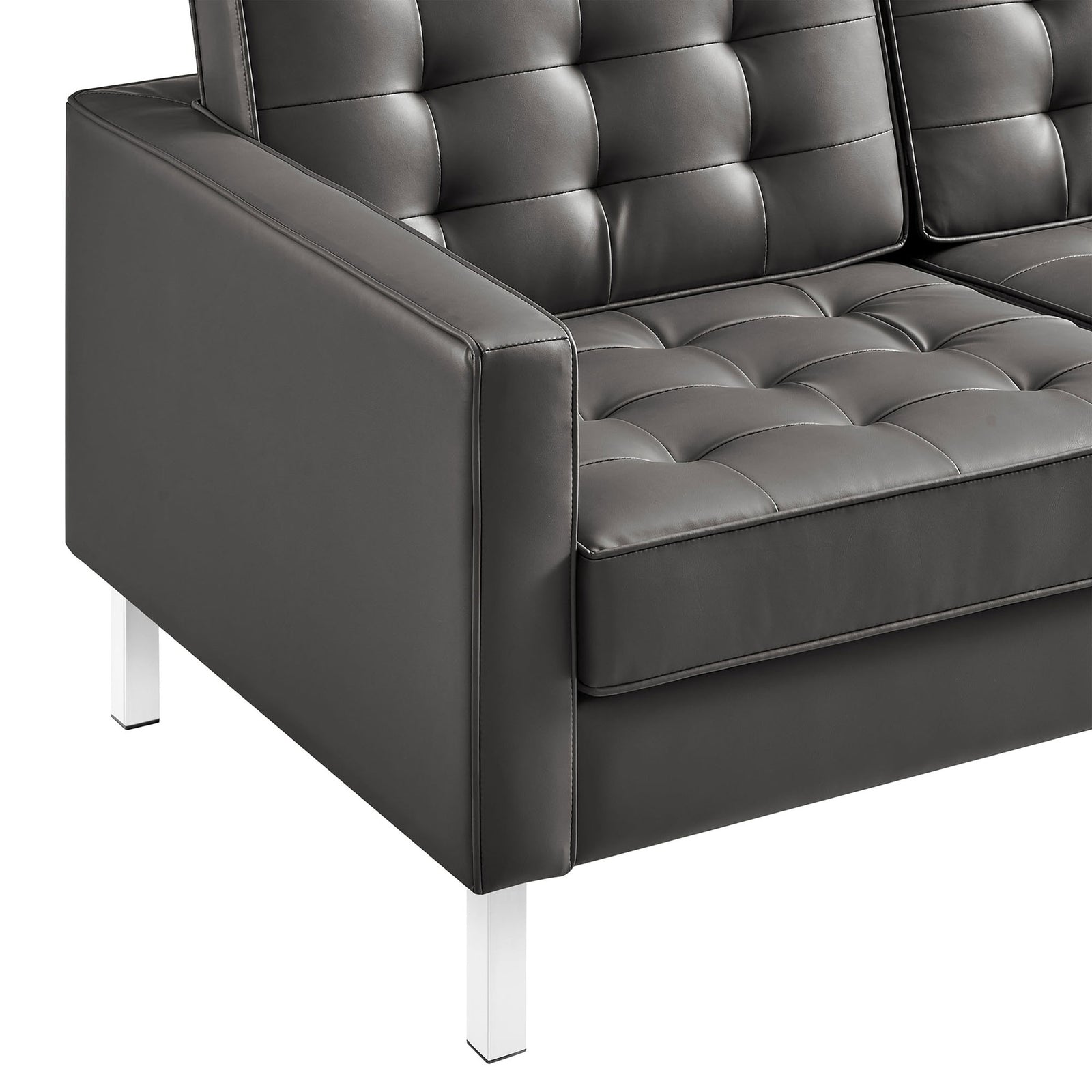 Detail of tufted vegan leather seat and back cushions with crisp stitching and slim arm design || EEI-3385-SLV-GRY || detail_studio