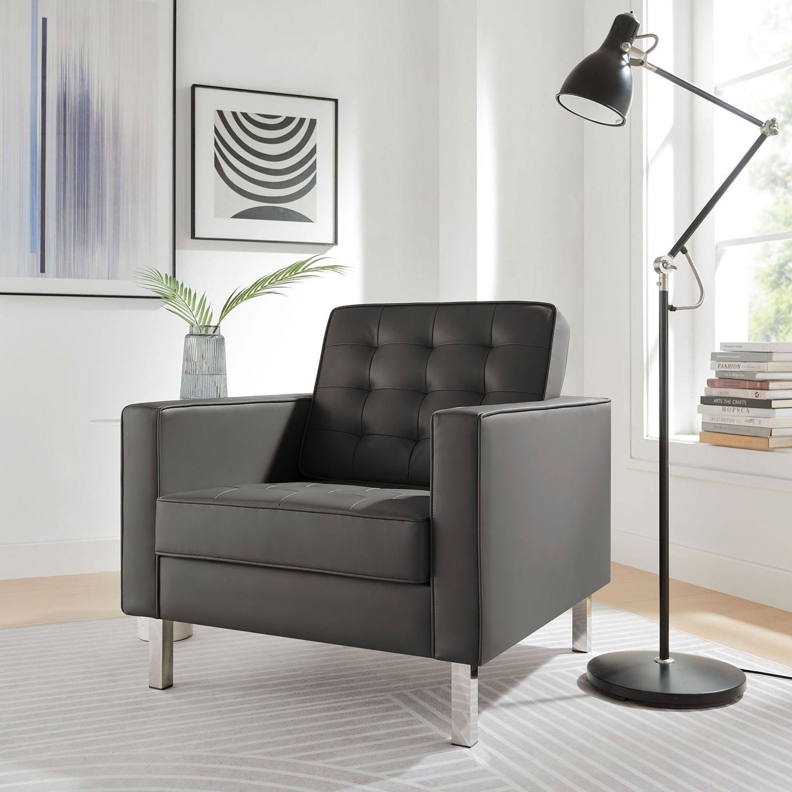 Modern armchair elevates the living room with luxe vegan leather and minimalist steel legs || EEI-3391-SLV-GRY || front_angle_room