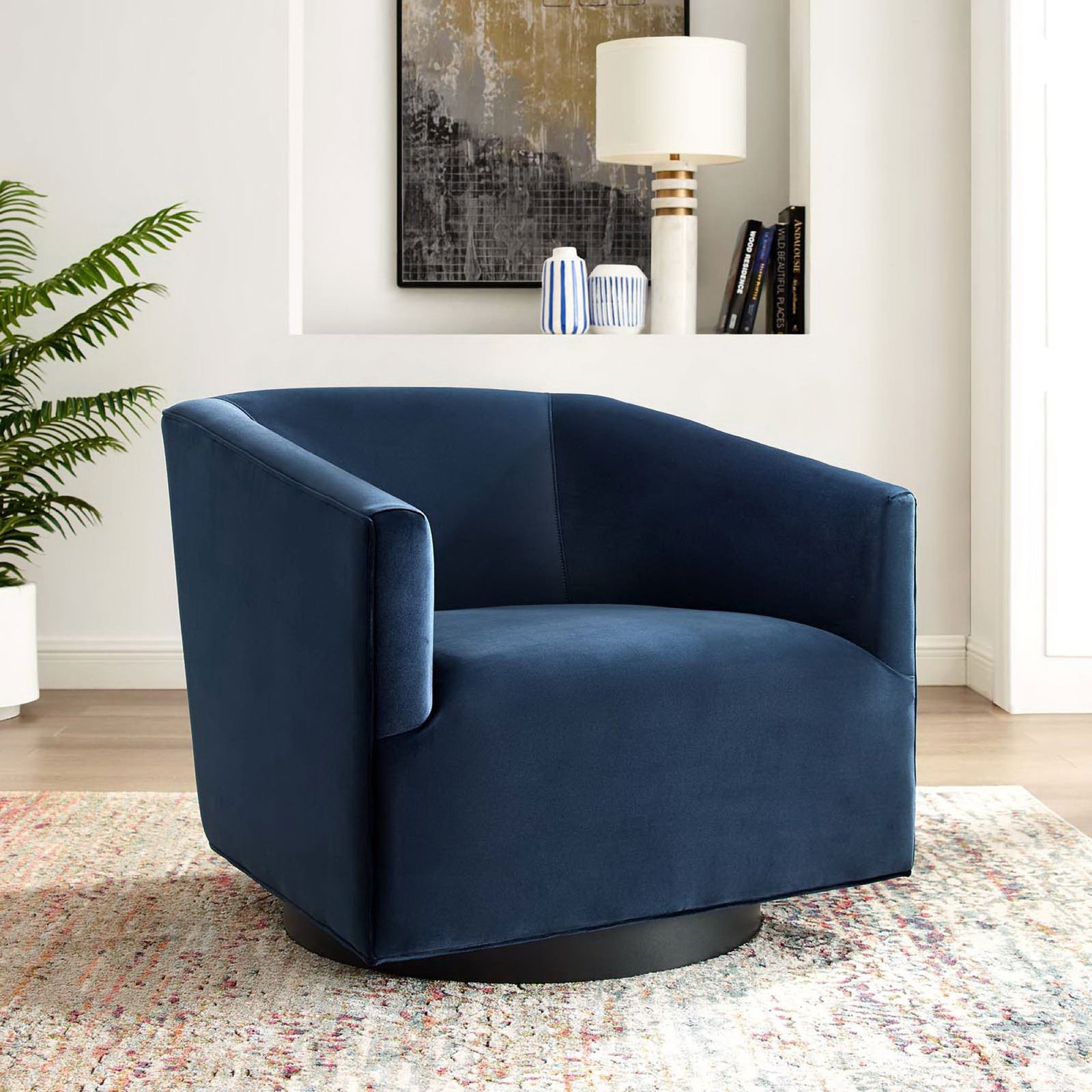 Modern swivel lounge chair in deep blue velvet adds a luxe touch to living spaces. || EEI-3456-MID || front_angle_room