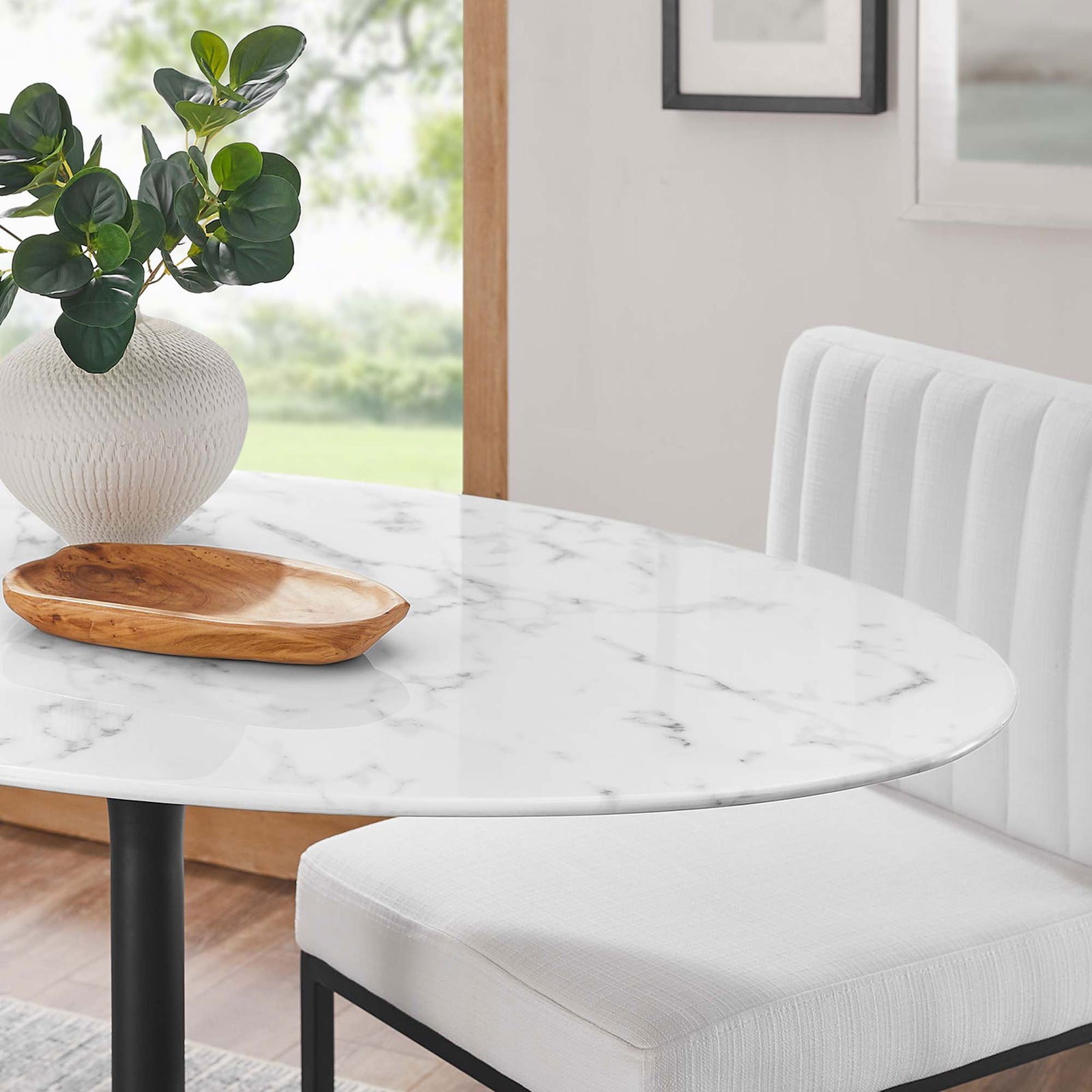Glossy faux marble tabletop adds a bright, modern touch to a cozy dining nook in the Lippa 48 inch table || EEI-3518-BLK-WHI || detail_room