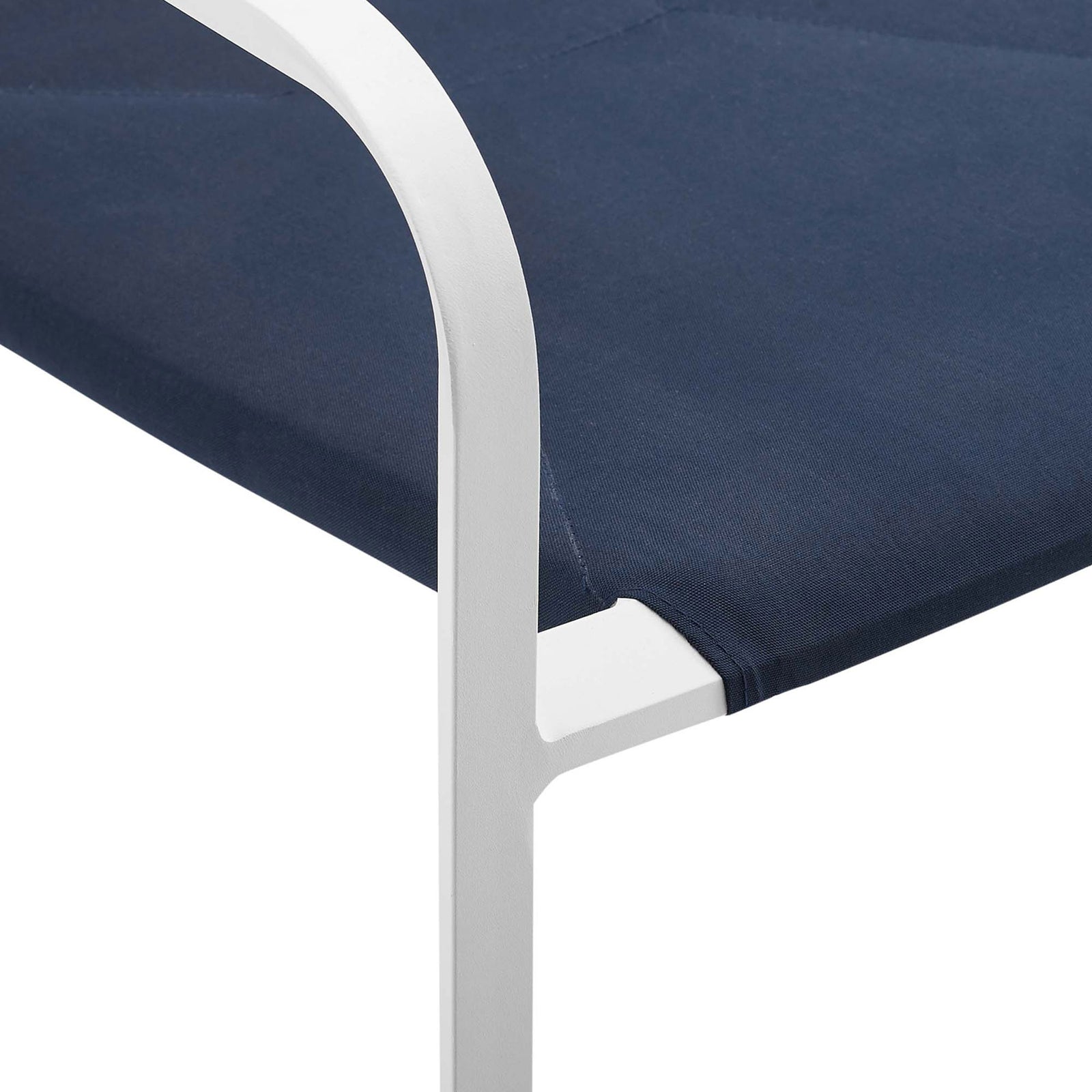 White aluminum arm and neatly tailored navy seat deliver durable, comfortable outdoor support || EEI-3573-WHI-NAV || detail_studio