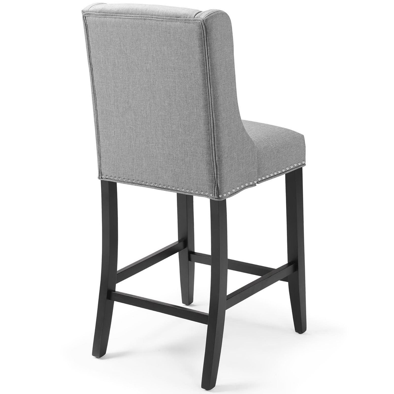 Tailored back with clean seams and a row of silver nailheads over textured light gray fabric. || EEI-3735-LGR || back_angle_studio