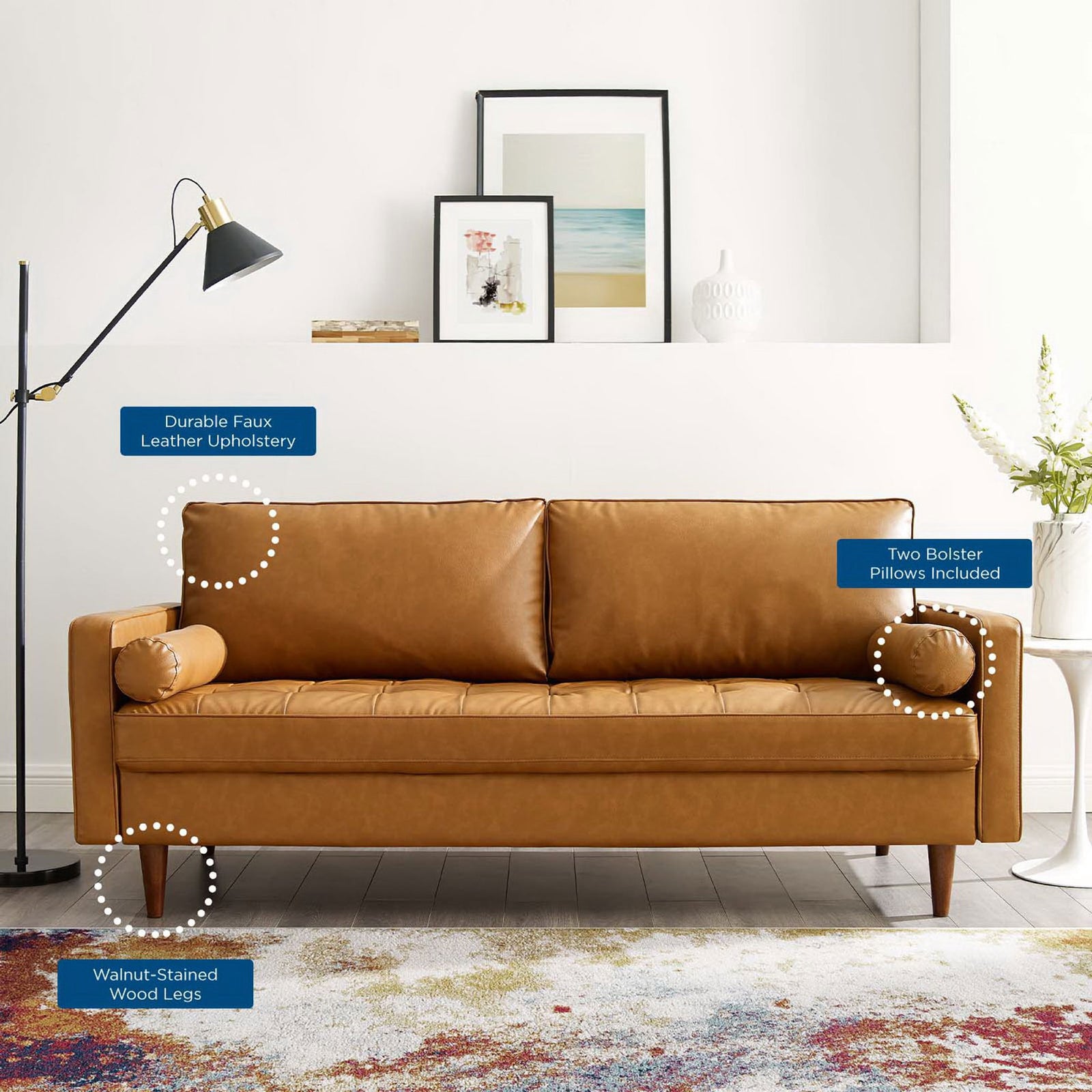 Tan vegan leather sofa in a bright room with callouts to durable upholstery, bolster pillows, and wood legs || EEI-3765-TAN || callout_room