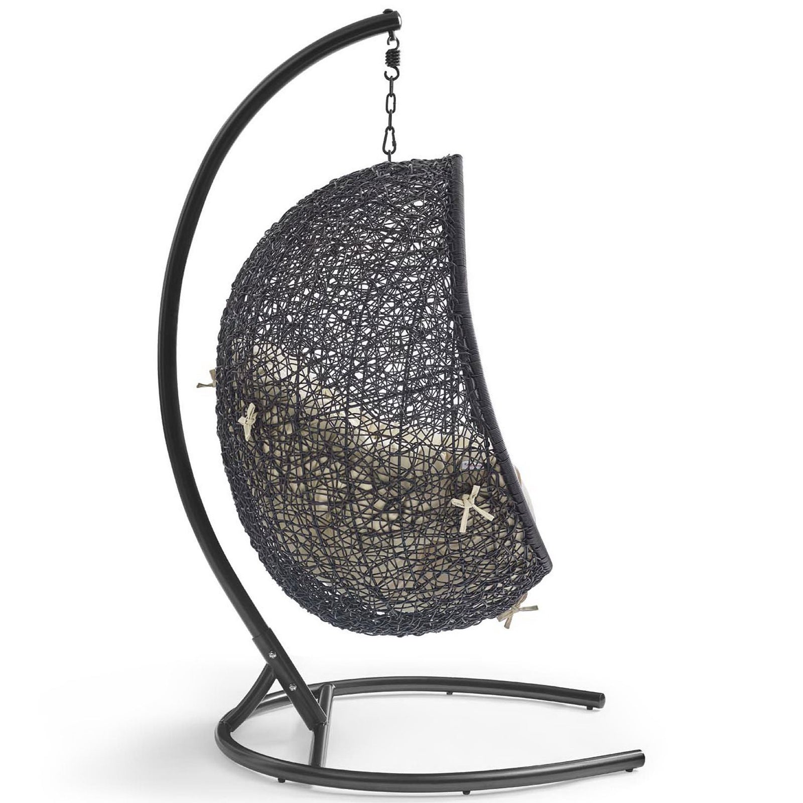 Sculptural hanging lounge chair profile with beige cushion cradled in espresso rattan frame || EEI-3943-BLK-BEI || side_studio
