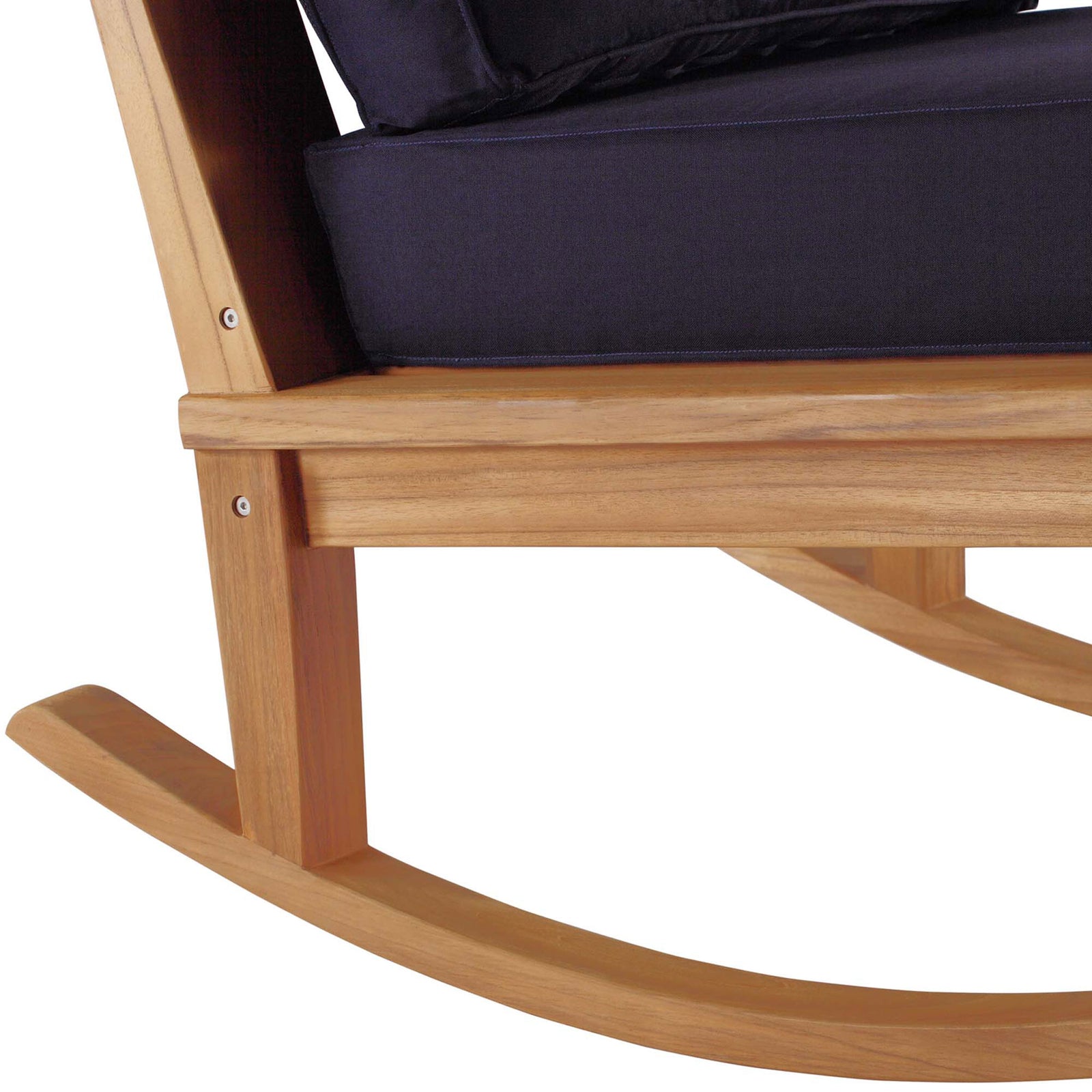 Close up of Marina rocker base showing sturdy teak frame and curved rockers beneath navy cushion || EEI-4177-NAT-NAV || detail_studio