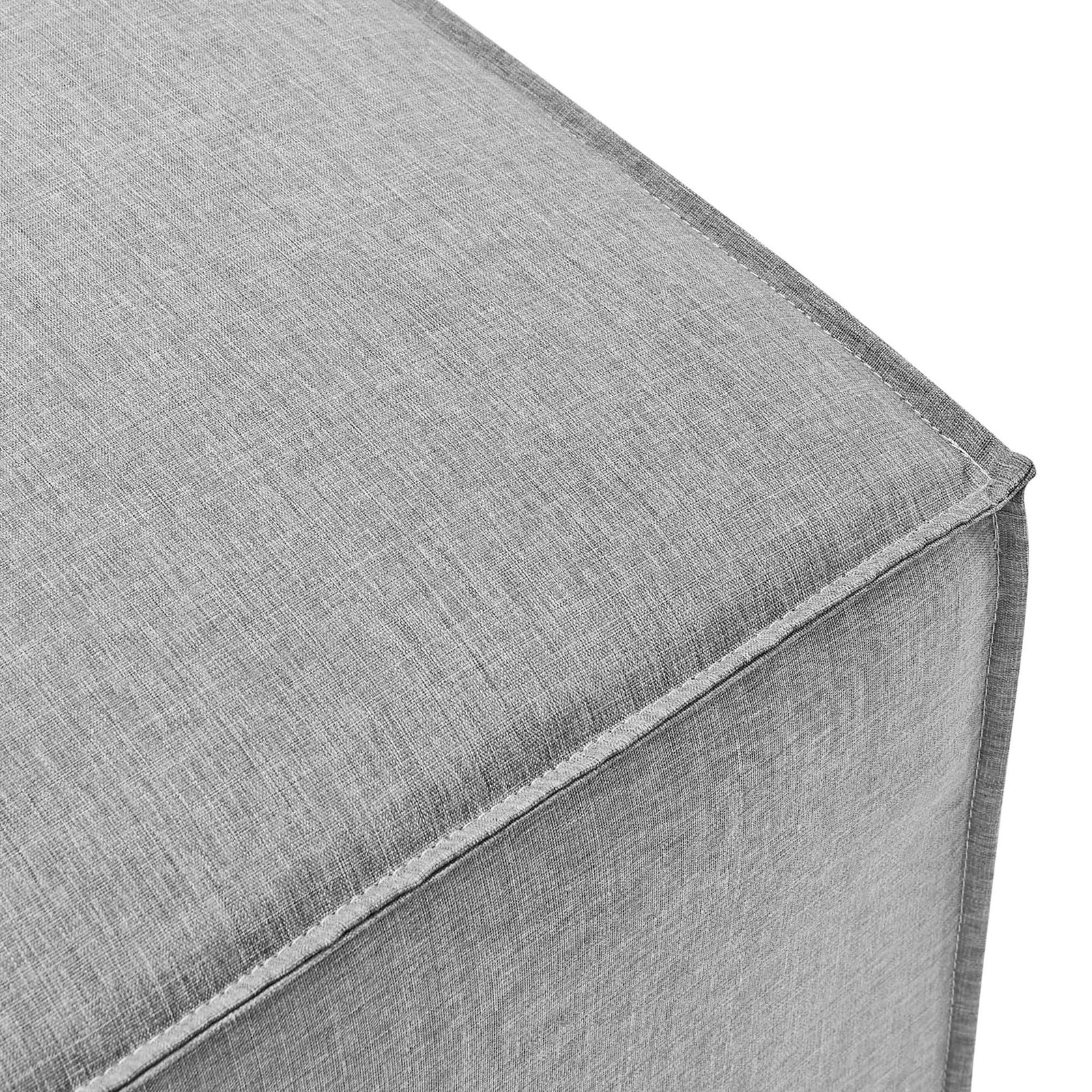 Gray upholstered ottoman corner with fine stitching and tailored piping for a refined finish || EEI-4211-GRY || detail_studio