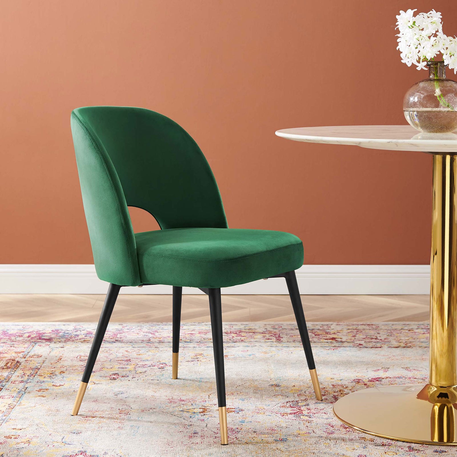 Emerald velvet dining chair paired with a marble-top table for a glamorous modern dining look. || EEI-4212-EME || front_angle_room