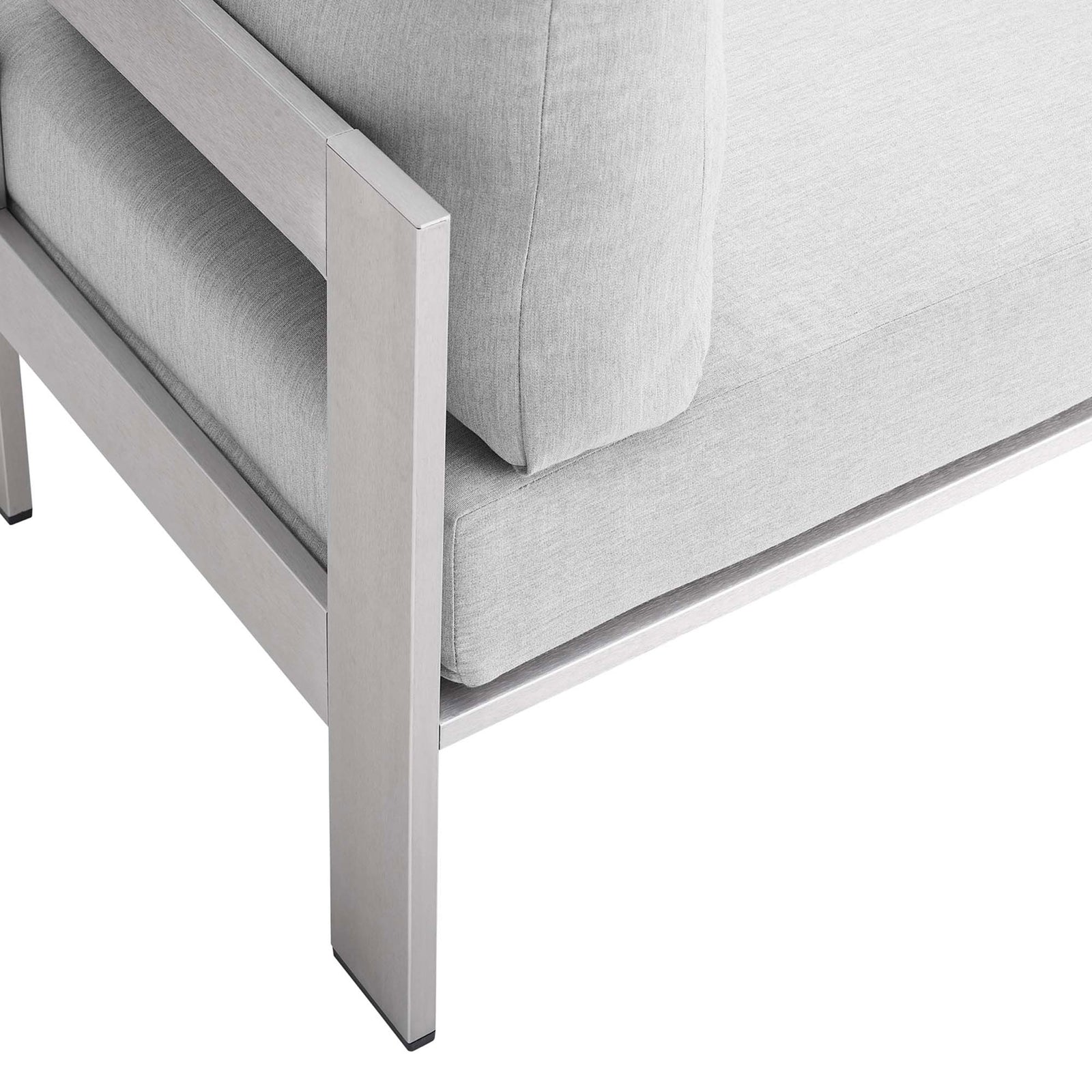 Neatly tailored cushion edges and brushed aluminum frame detailing add upscale polish || EEI-4227-SLV-GRY || detail_studio