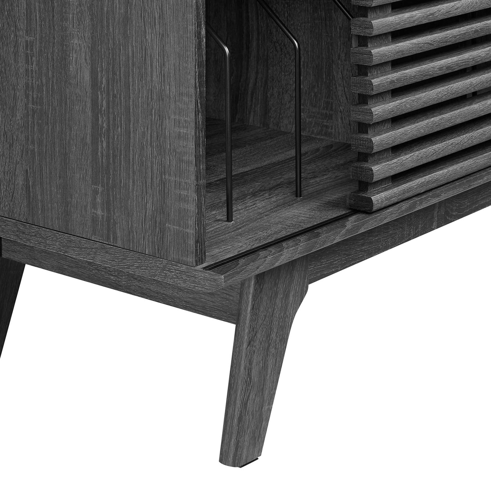Detail of charcoal stand leg, showing wood grain texture and sturdy construction at the base. || EEI-4263-CHA || leg_studio