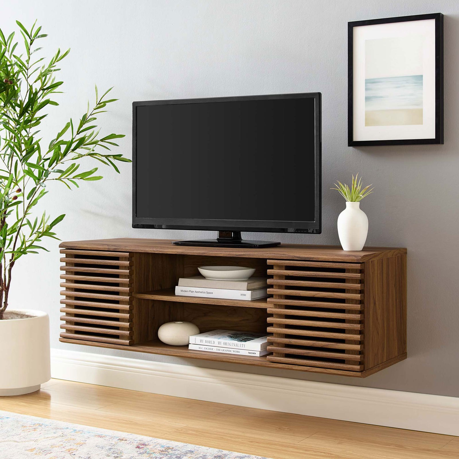 Walnut 46 inch wall-mounted media console styled in a living room beneath a flat-screen TV. || EEI-4266-WAL || front_angle_room