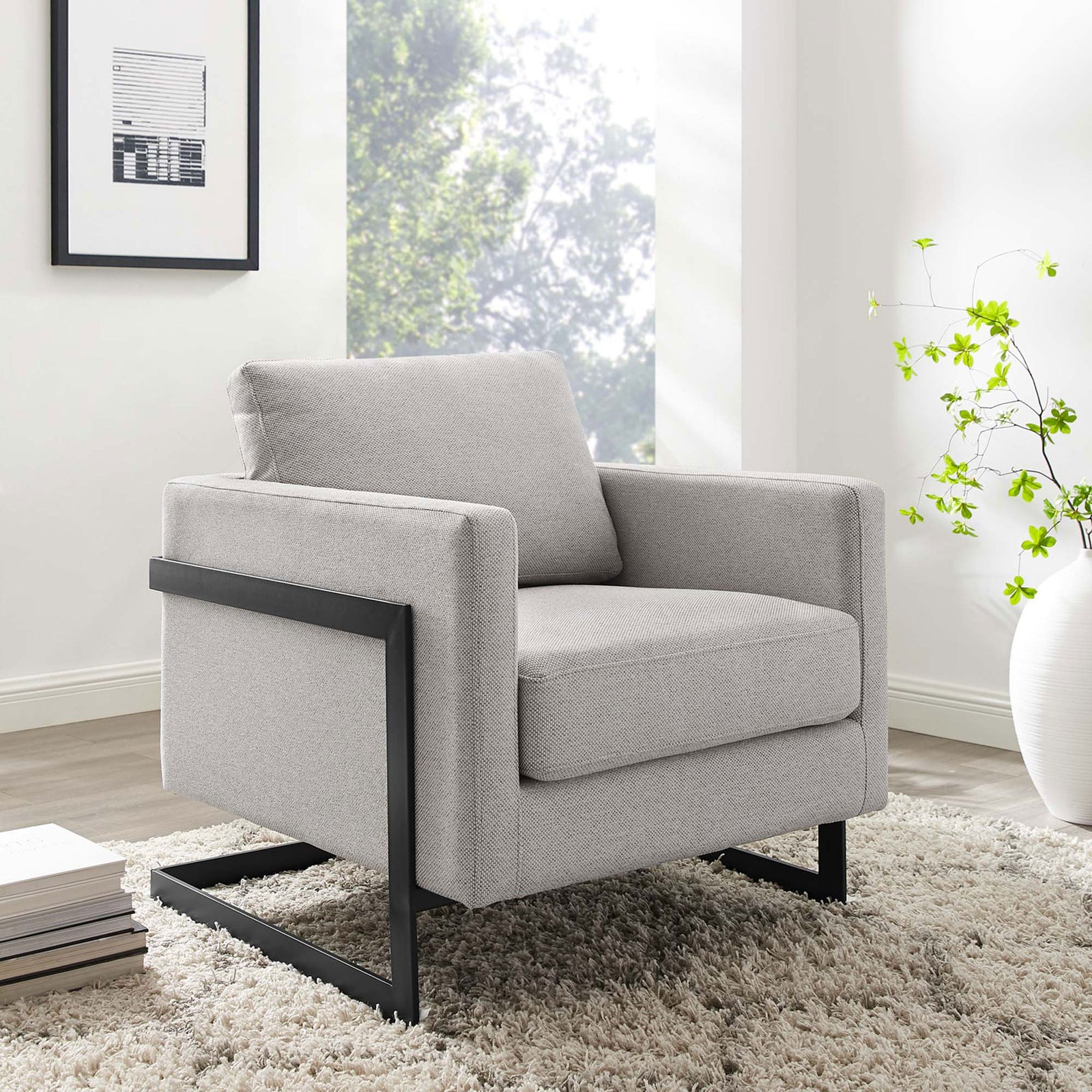 Modern accent chair brings clean lines and cozy comfort to a bright living space || EEI-4391-BLK-CAM || front_angle_room