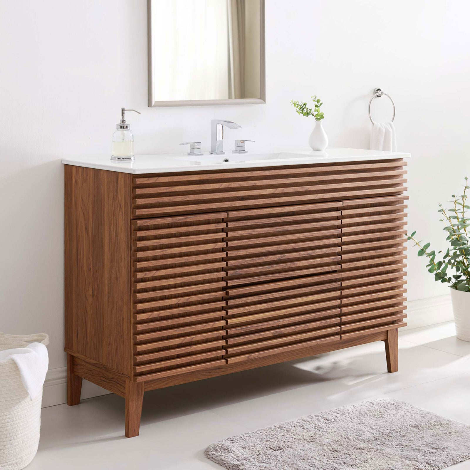 Mid-century vanity warms the bath with walnut slats and a glossy white integrated sink. || EEI-4439-WAL-WHI || front_angle_room