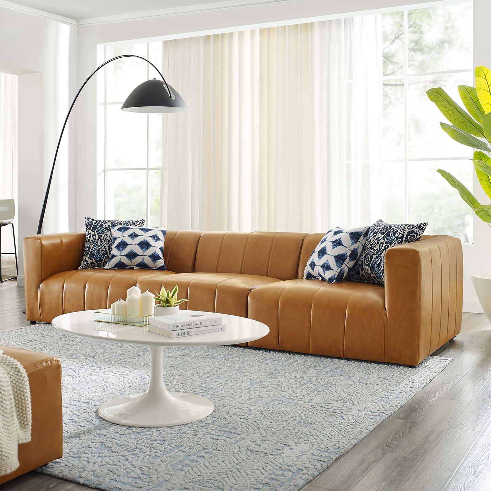 Bartlett tan vegan leather 3-piece sofa styled in a bright living room with modern decor || EEI-4515-TAN || front_angle_room