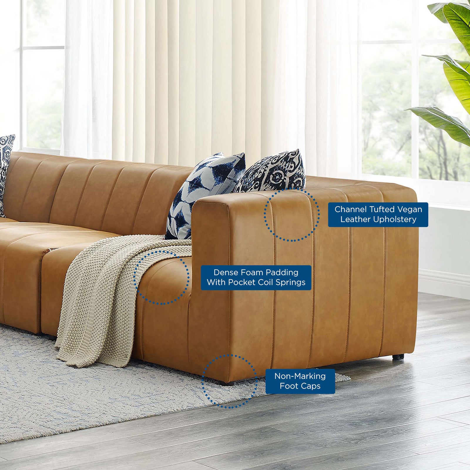 Feature callouts highlight plush cushioning, foot caps, and channel tufted vegan leather upholstery || EEI-4532-TAN || callout_room